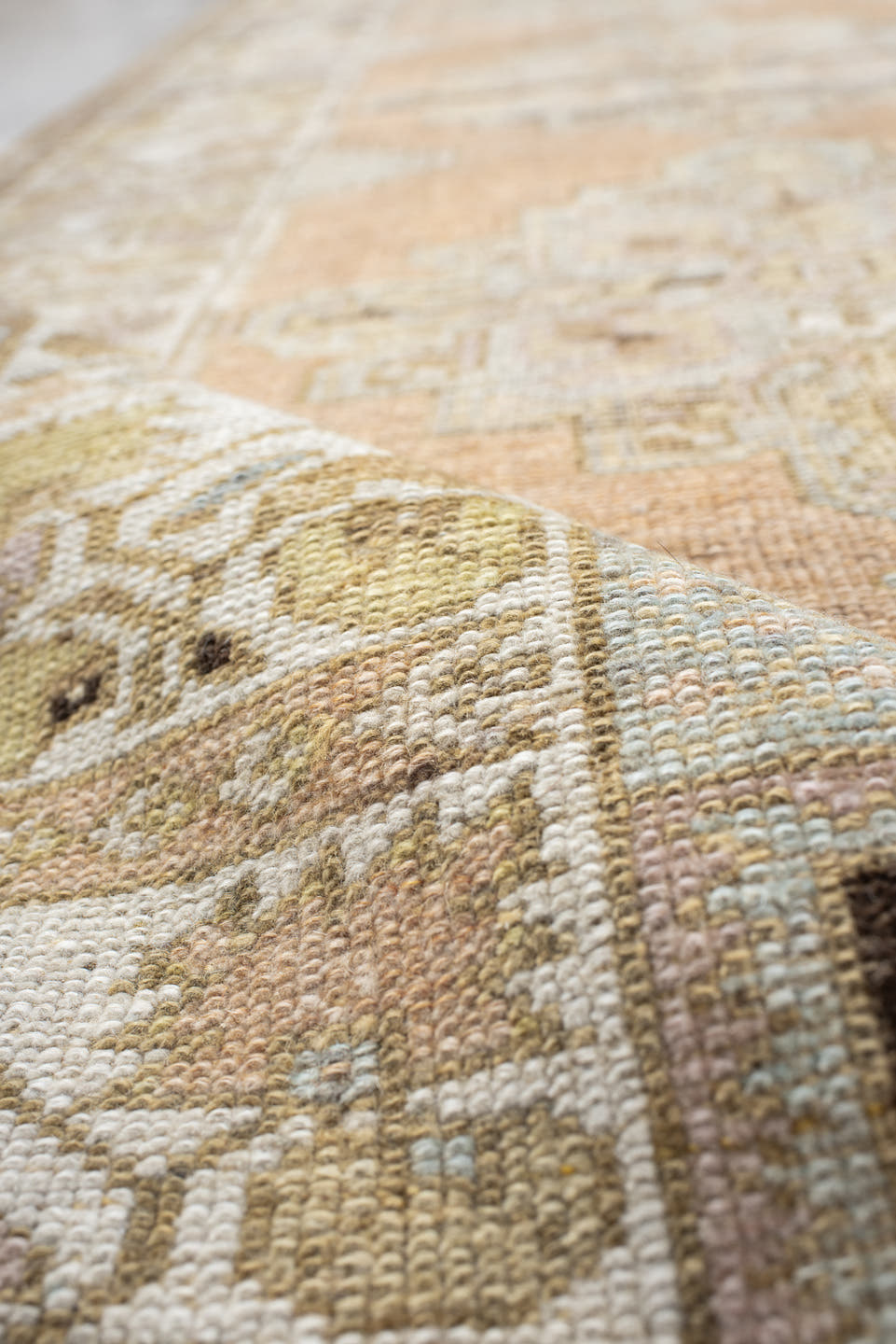 3' x 10' one-of-a-kind handmade vintage Oushak runner rug. Color palette: peach, ivory, taupe, sage, camel, charcoal, cream