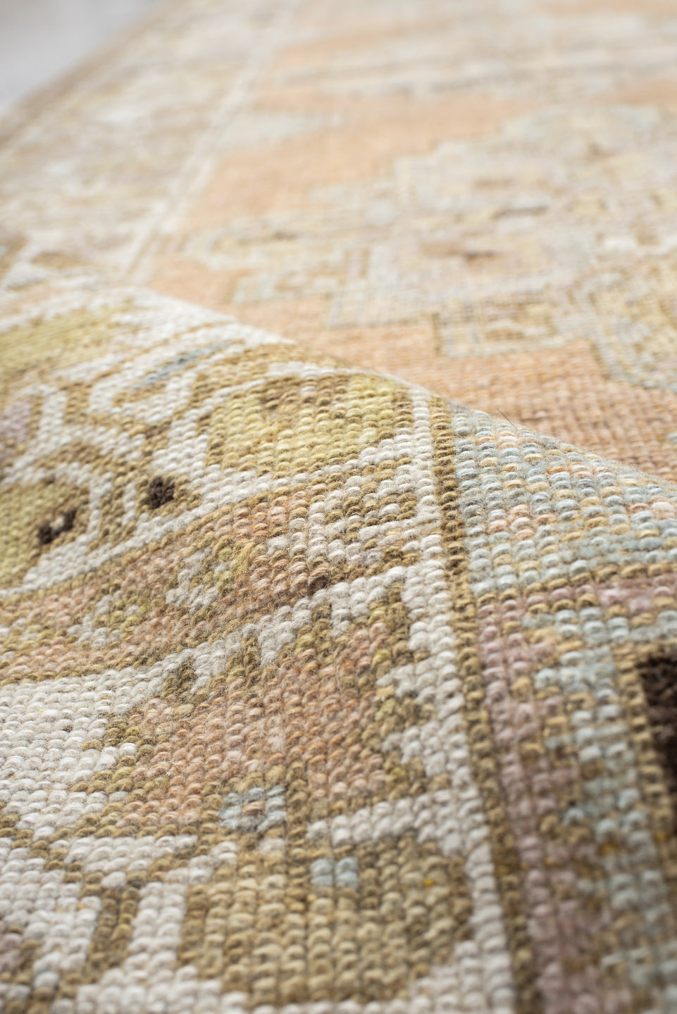 3' x 10' one-of-a-kind handmade vintage Oushak runner rug. Color palette: peach, ivory, taupe, sage, camel, charcoal, cream