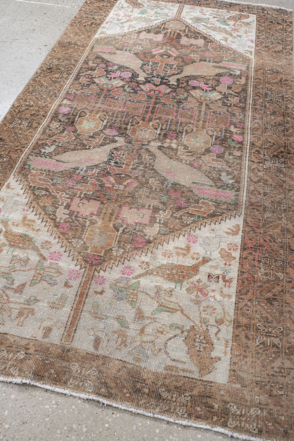2' x 4' one-of-a-kind handmade vintage Belouch small size rug. Color palette: brown, ivory, camel, rose, aqua, taupe