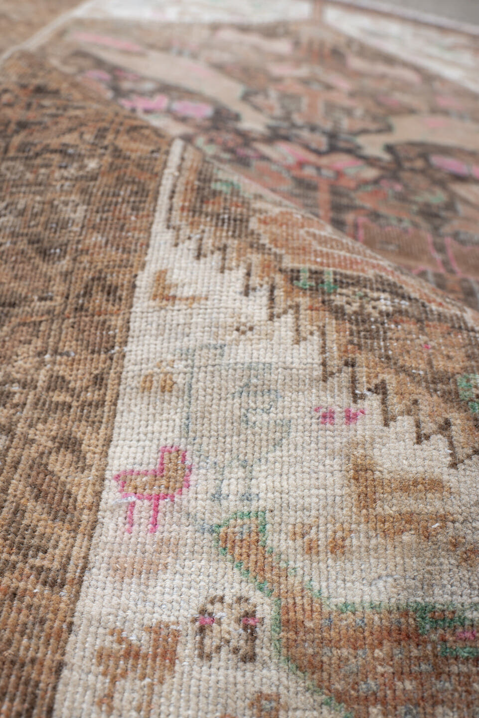2' x 4' one-of-a-kind handmade vintage Belouch small size rug. Color palette: brown, ivory, camel, rose, aqua, taupe