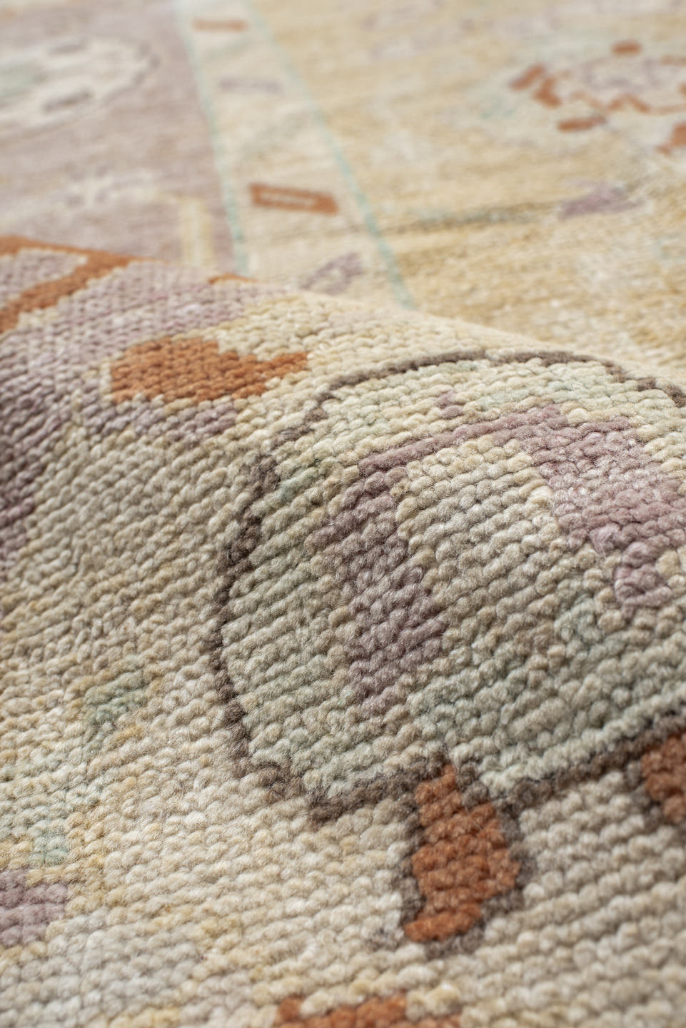 9' x 11' one-of-a-kind handmade vintage Oushak large size rug. Color palette: ivory, lavender, peach, pale gold, sky blue