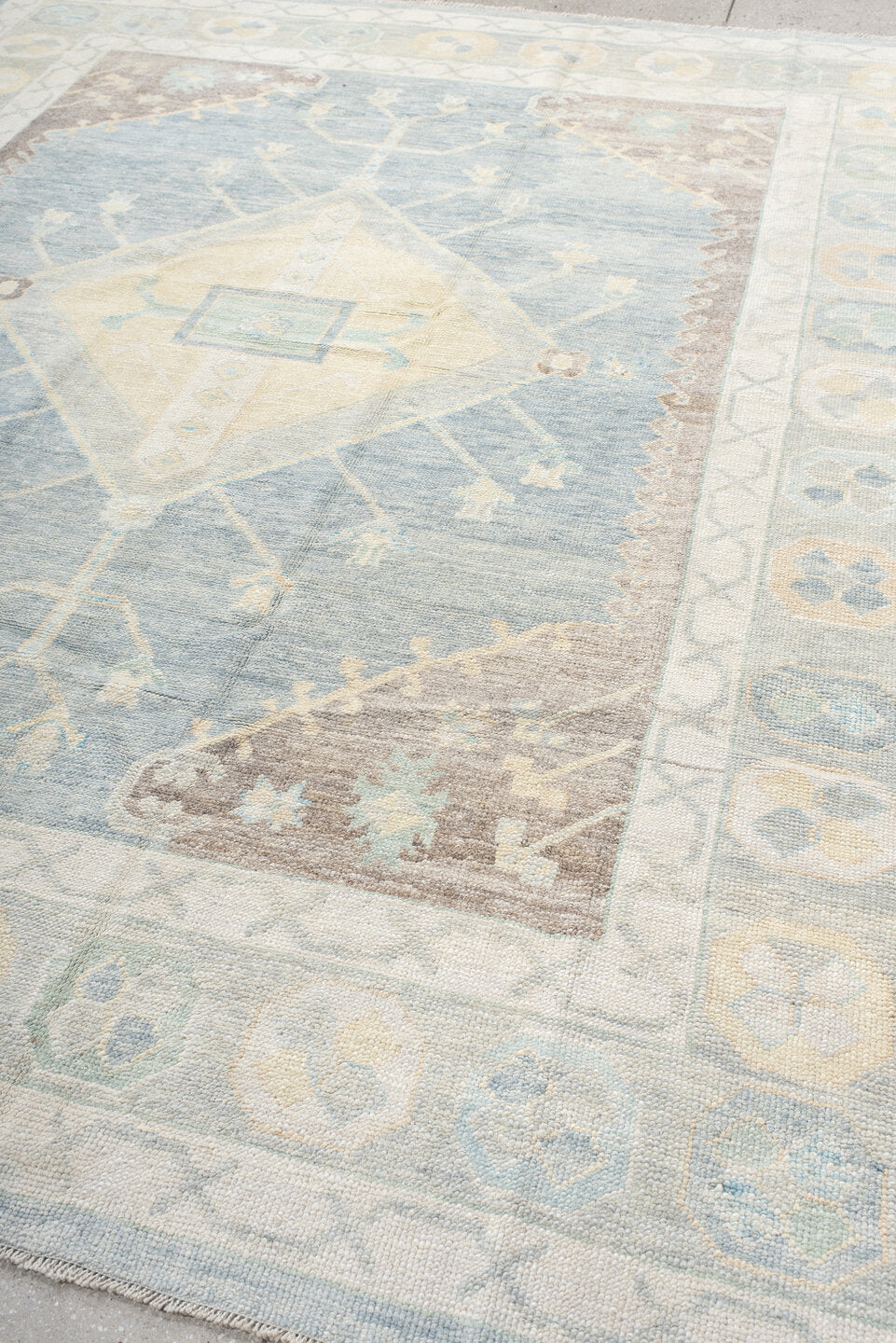 8' x 10' one-of-a-kind handmade vintage Oushak large size rug. Color palette: pale blue, ivory, cream, taupe, beige