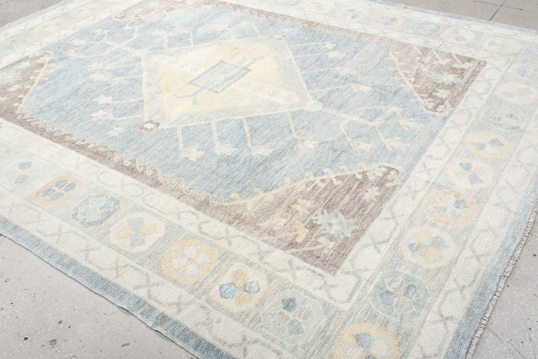 8' x 10' one-of-a-kind handmade vintage Oushak large size rug. Color palette: pale blue, ivory, cream, taupe, beige