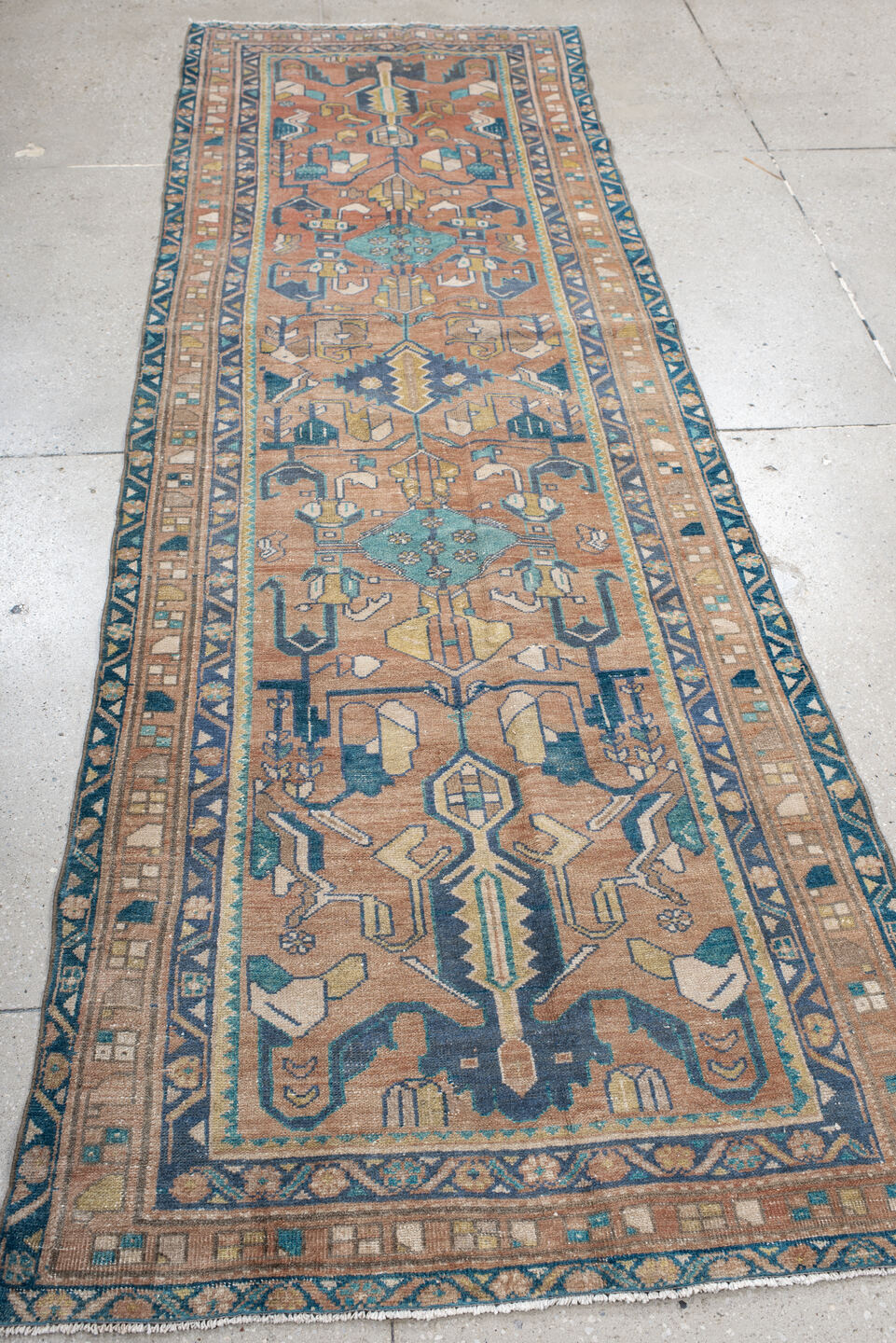 3' x 9' one-of-a-kind handmade vintage Lilian runner rug. Color palette: rose, teal, ivory, navy, camel, sage, taupe, pink