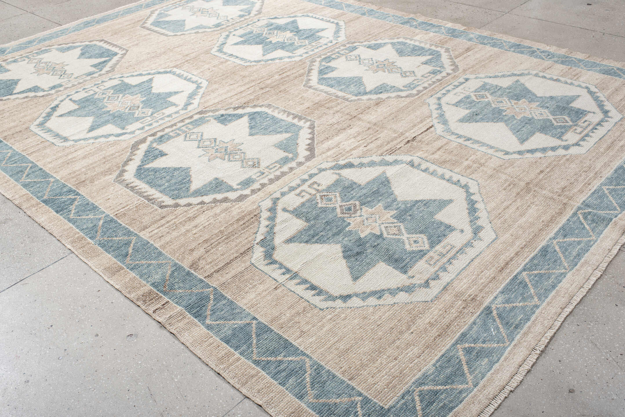 9' x 12' one-of-a-kind handmade vintage Oushak large size rug. Color palette: ivory, pale blue, taupe, beige, gray