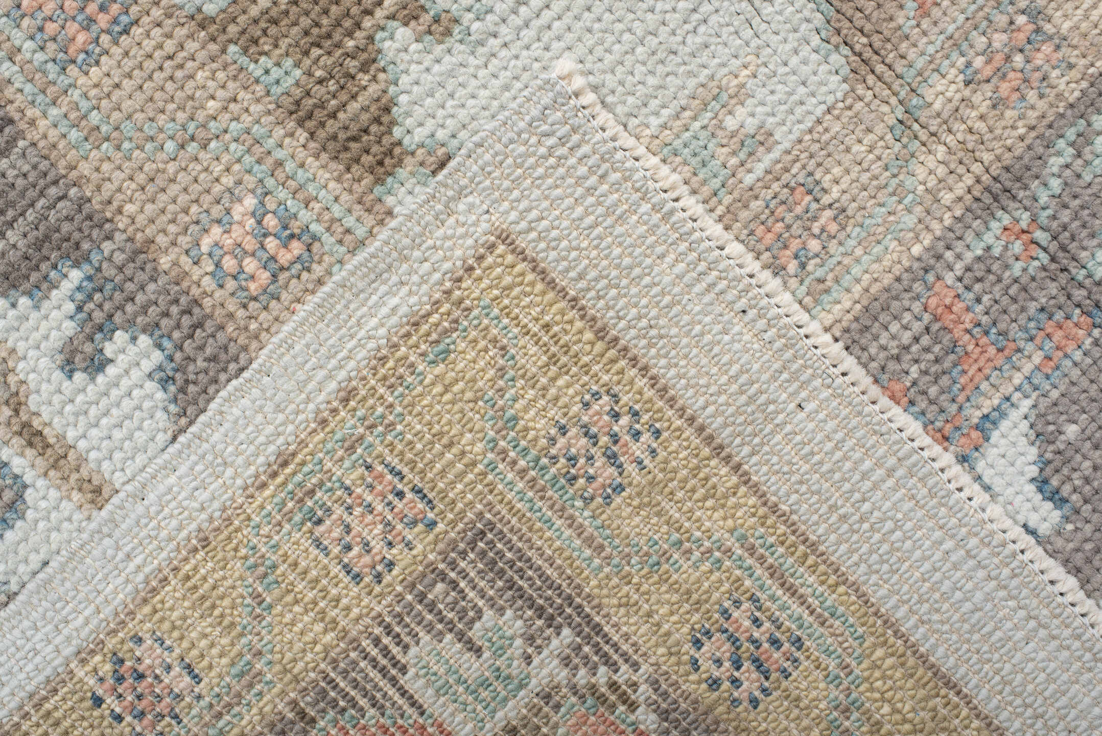 9' x 12' one-of-a-kind handmade vintage Oushak large size rug. Color palette: ivory, taupe, sage, muted blue, coral, brown