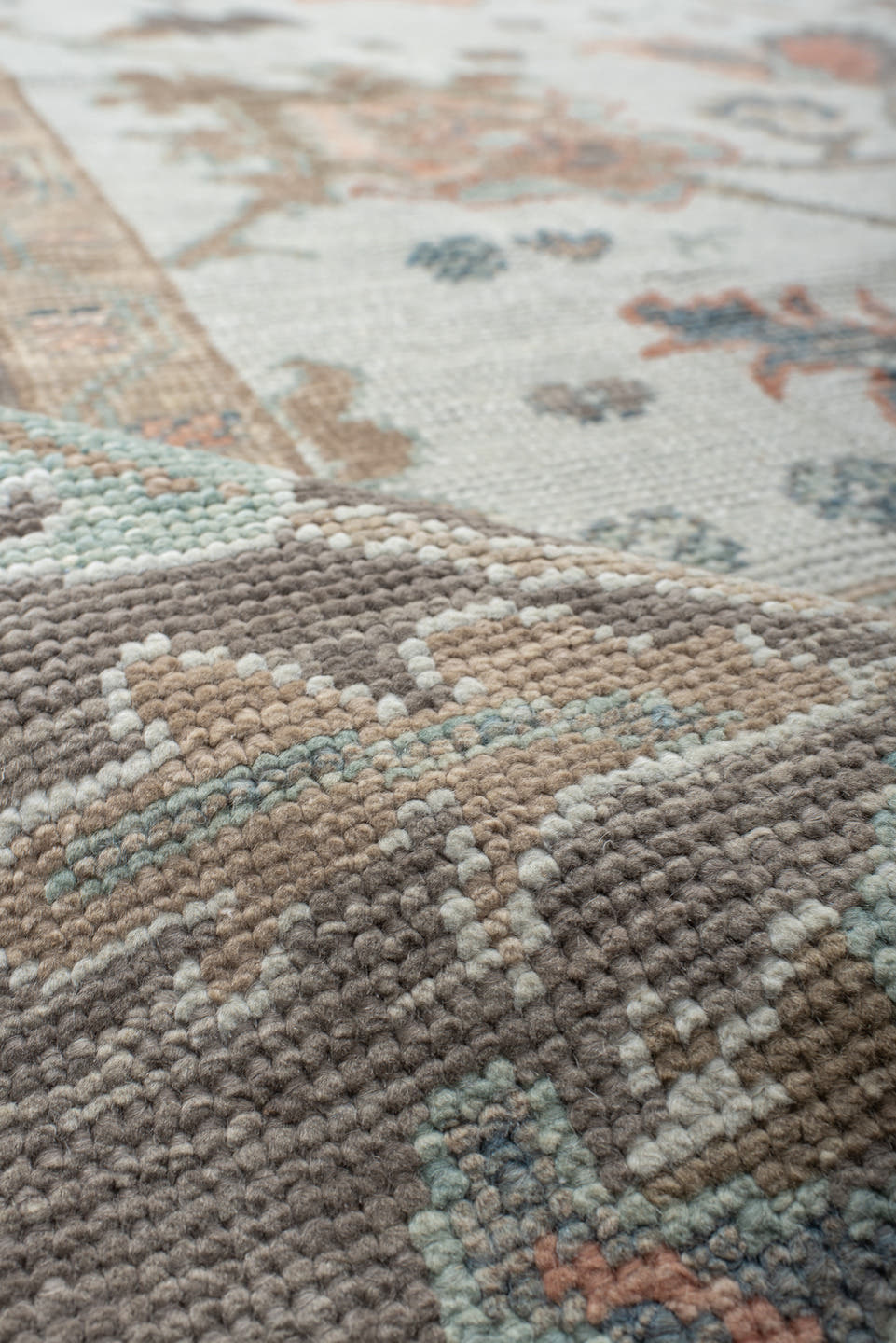 9' x 12' one-of-a-kind handmade vintage Oushak large size rug. Color palette: ivory, taupe, sage, muted blue, coral, brown