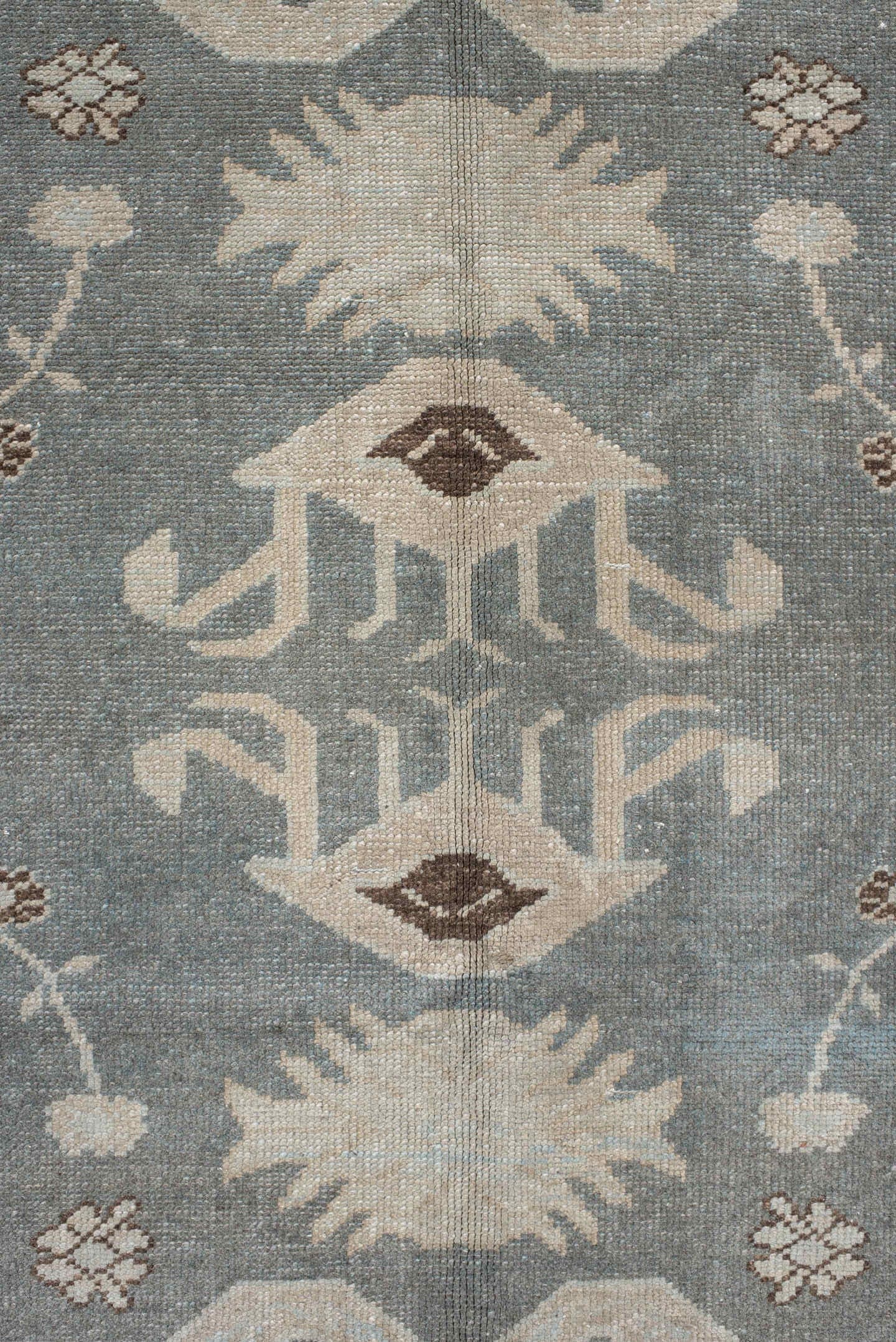 7' x 9' one-of-a-kind handmade vintage Anatolian rug. Color palette: ivory, slate, taupe, charcoal, brown, pale blue, gray