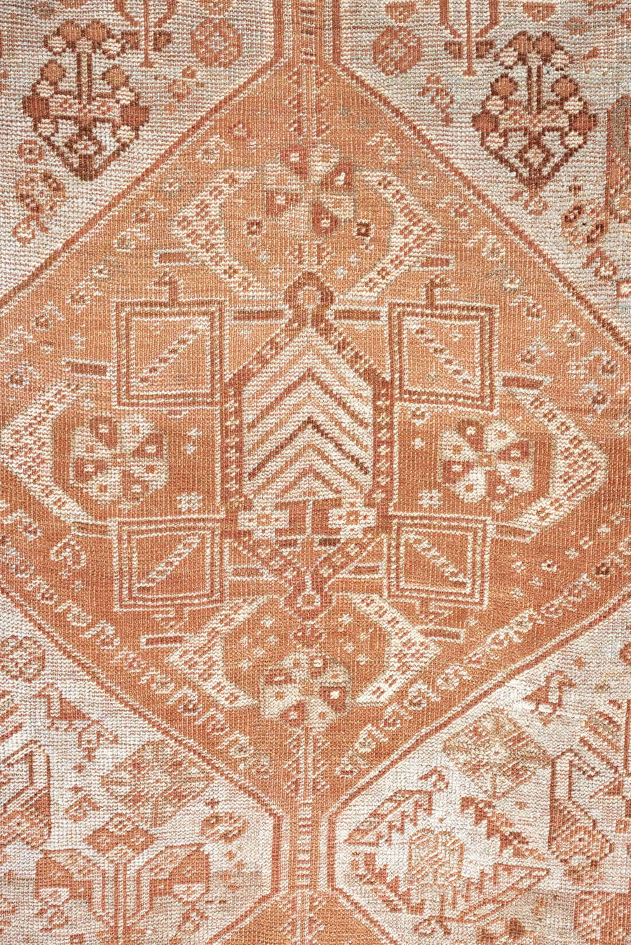 7' x 10' one-of-a-kind handmade antique Shiraz large size rug. Color palette: terra cotta, ivory, rose, rust, camel