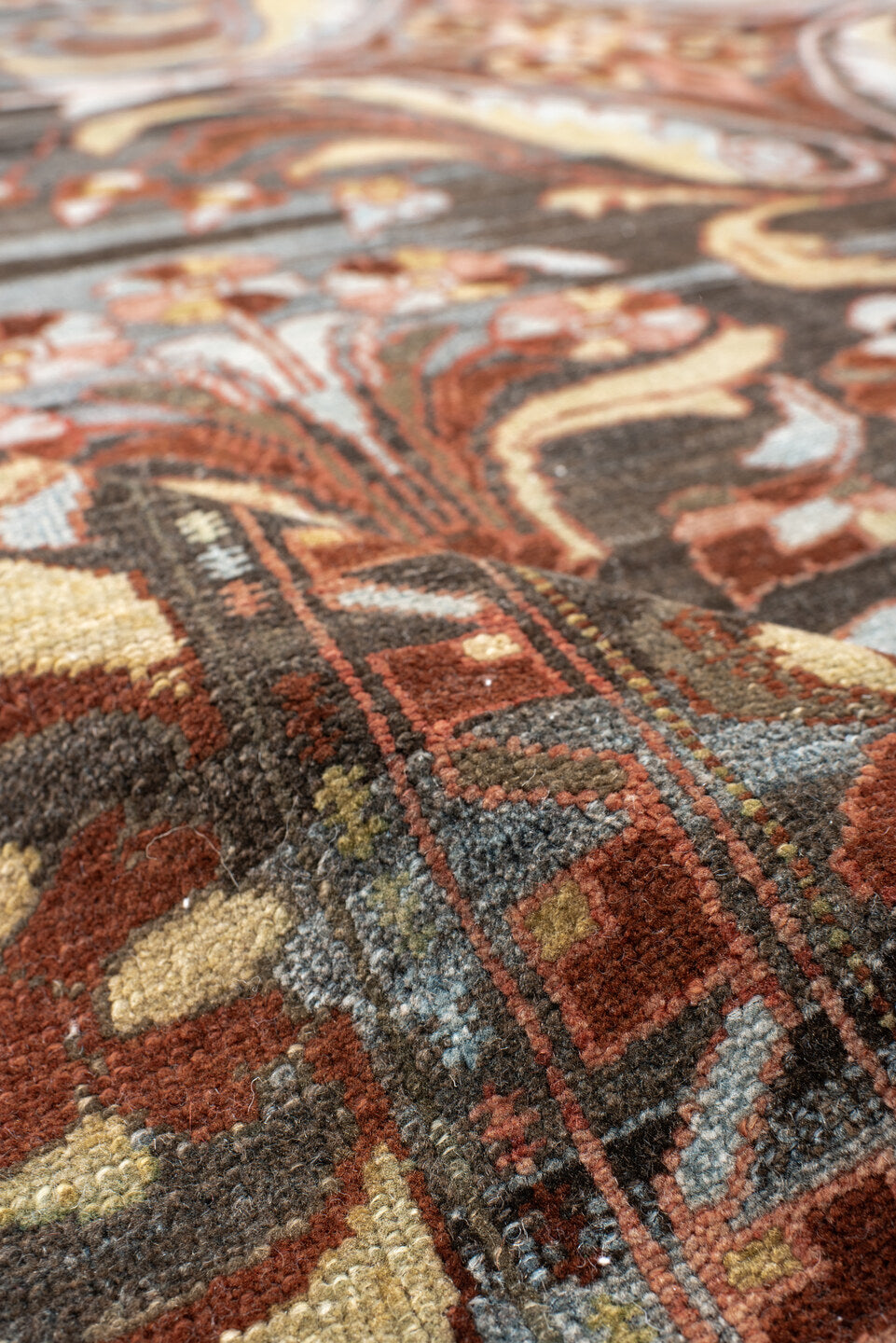 6' x 8' one-of-a-kind handmade antique Baktiary medium size rug. Color palette: charcoal, slate, rust, ivory, rose, camel