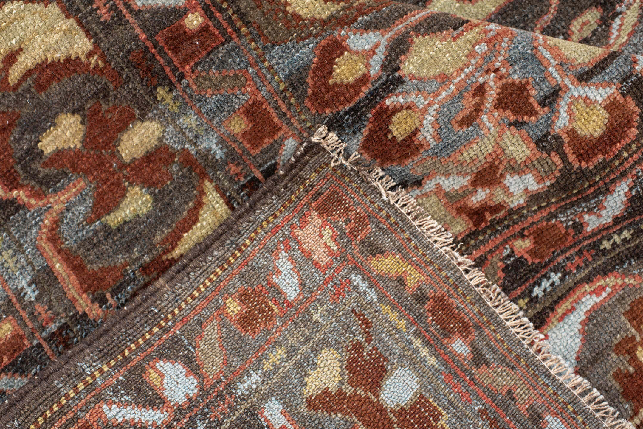 6' x 8' one-of-a-kind handmade antique Baktiary medium size rug. Color palette: charcoal, slate, rust, ivory, rose, camel