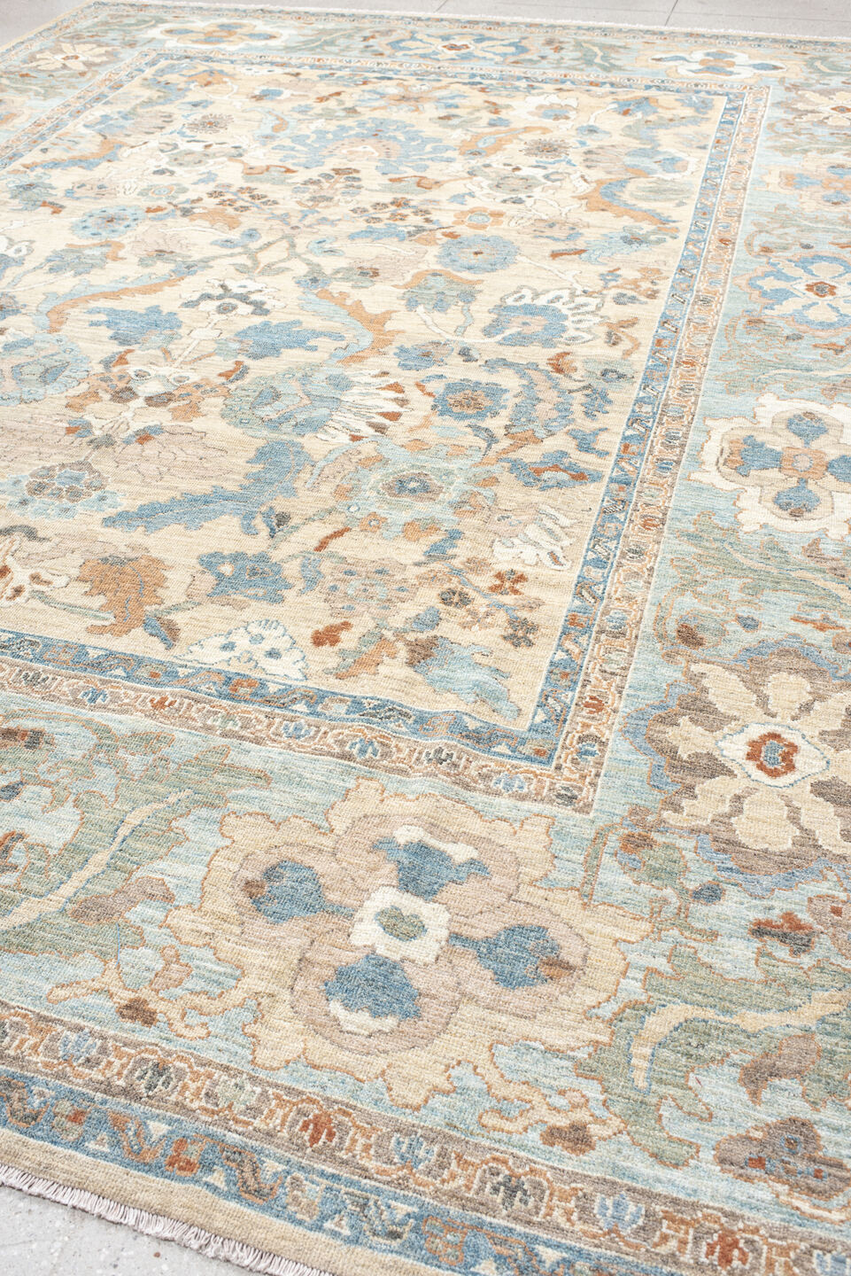 11' x 15' one-of-a-kind handmade vintage Sultanabad oversize rug. Color palette: ivory, pale blue, taupe, peach, beige, sage