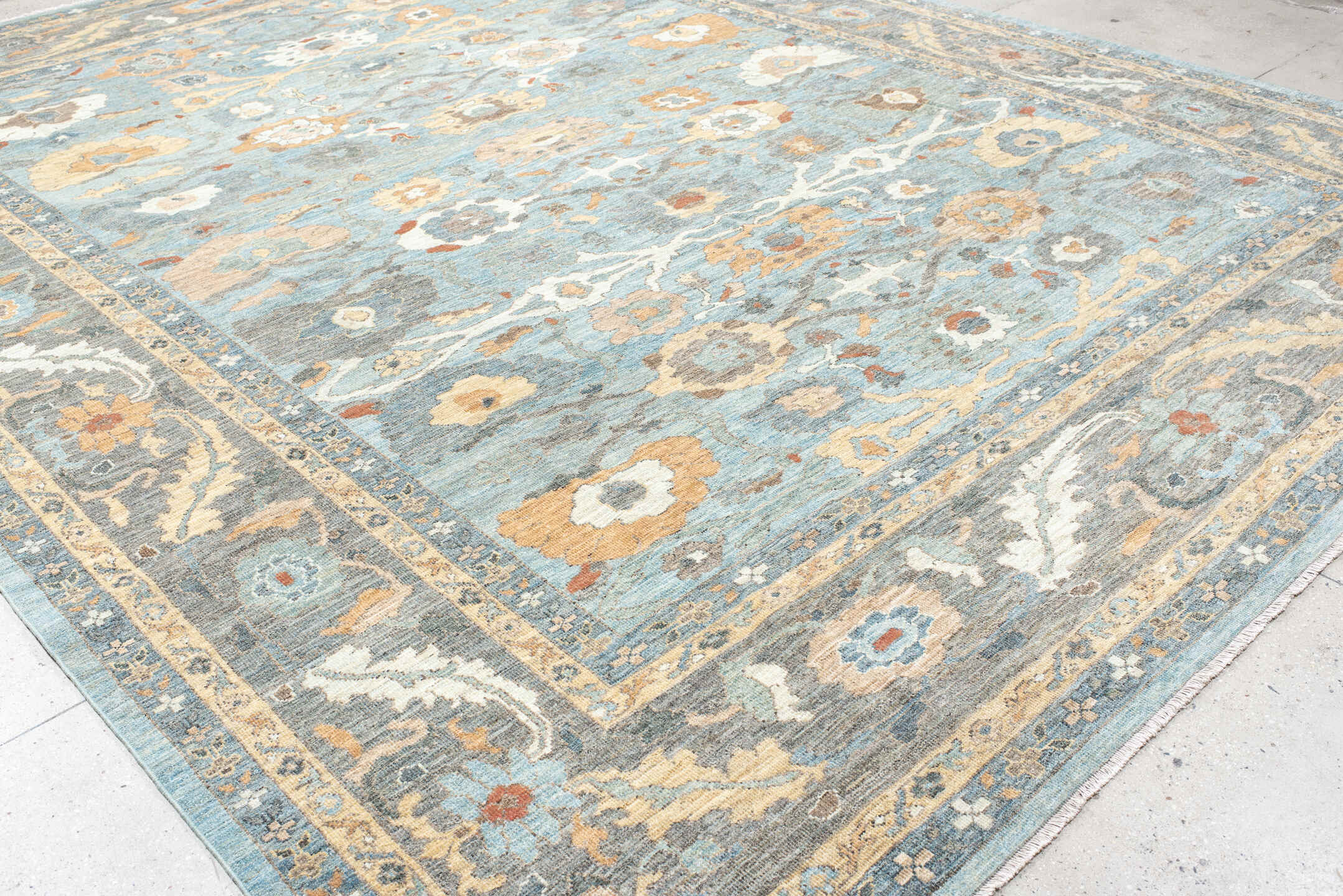 11' x 15' one-of-a-kind handmade vintage Sultanabad oversize rug. Color palette: light blue, gray, ivory, peach, taupe, rust