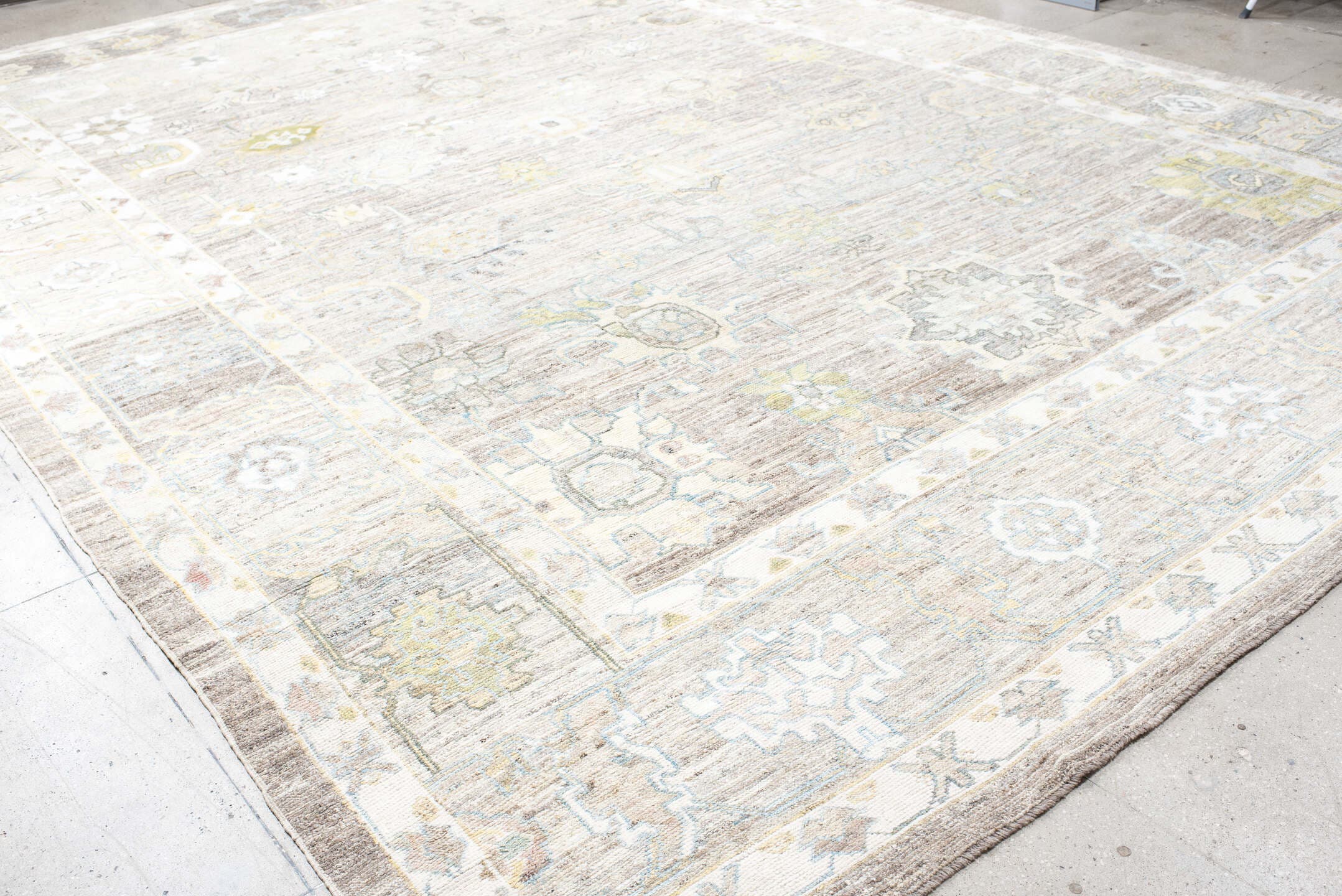 13' x 19' one-of-a-kind handmade vintage Oushak oversize rug. Color palette: taupe, ivory, light_blue, sage, gold, gray