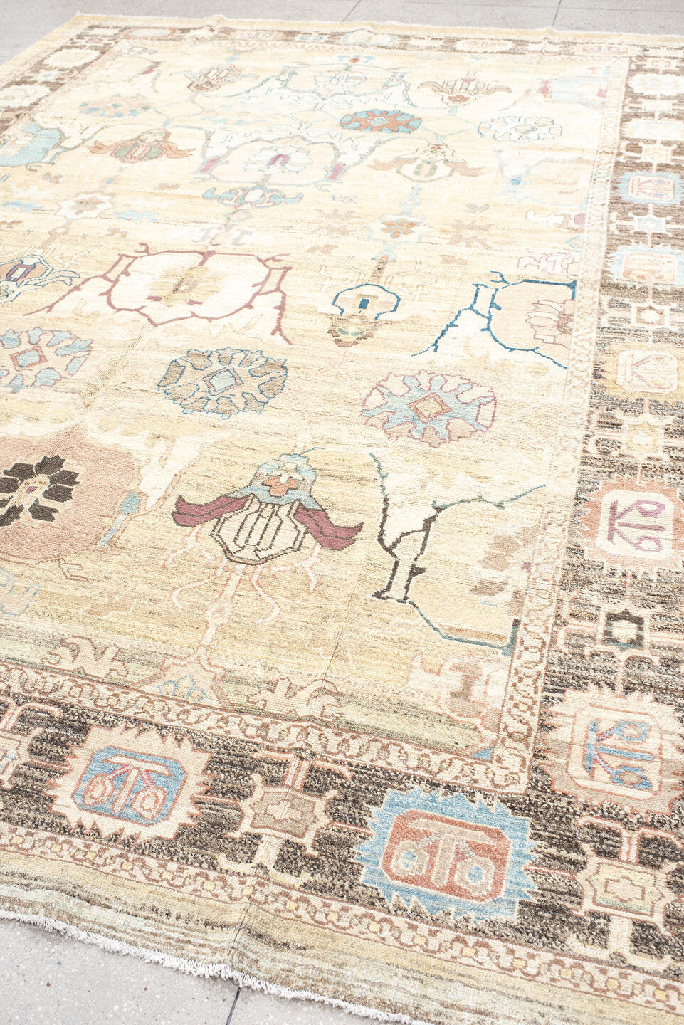 9' x 13' one-of-a-kind handmade vintage Bakhshayesh large size rug. Color palette: ivory, taupe, sky blue, brown, rose