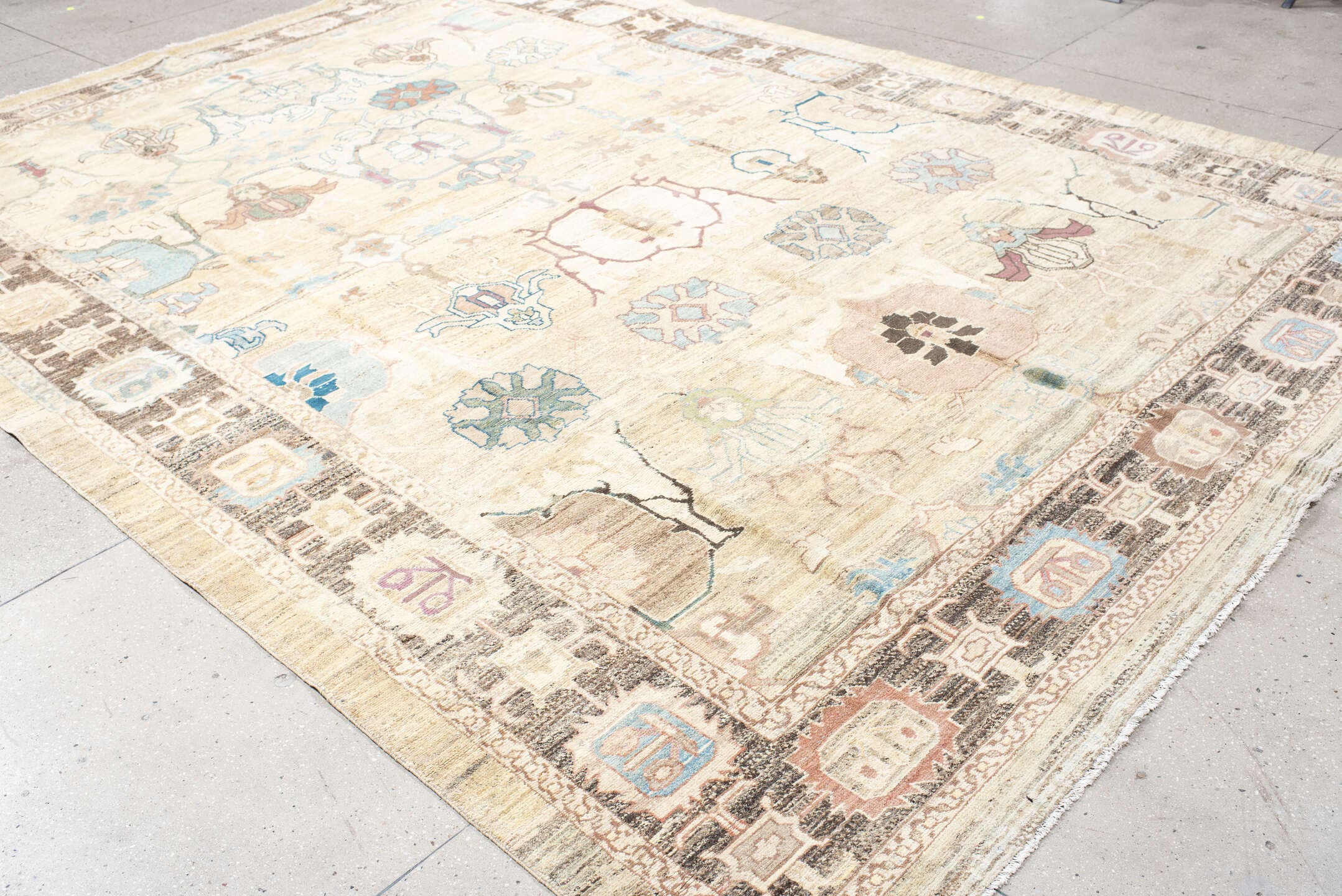 9' x 13' one-of-a-kind handmade vintage Bakhshayesh large size rug. Color palette: ivory, taupe, sky blue, brown, rose