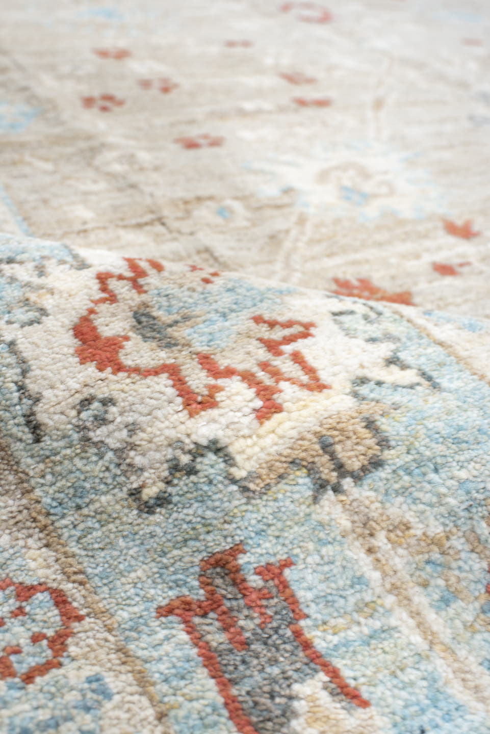 5' x 7' one-of-a-kind handmade vintage Sultanabad rug. Color palette: taupe, ivory, sky blue, rust, charcoal, cream, beige