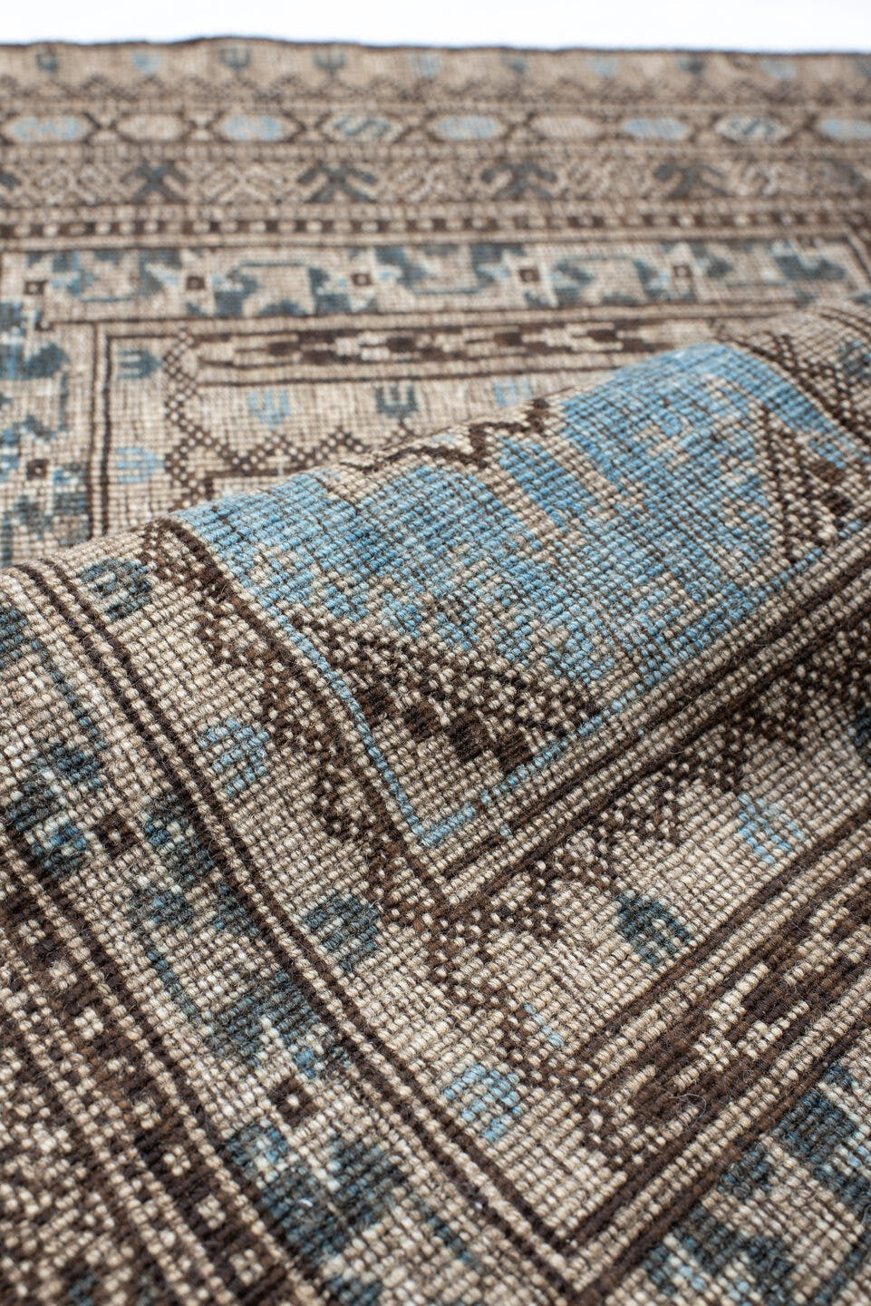 2' x 16' one-of-a-kind handmade vintage Bokara runner rug. Color palette: ivory, brown, sky blue, charcoal, taupe