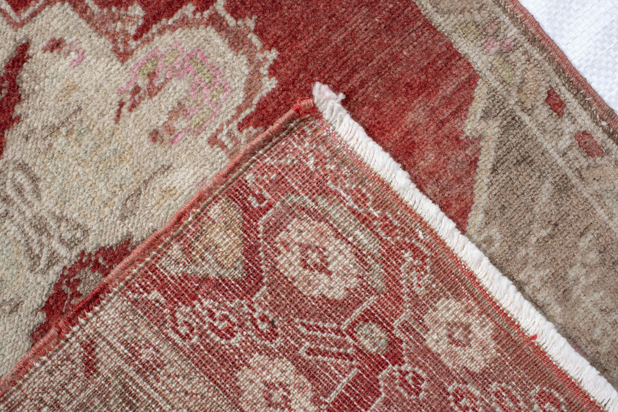 1' x 2' one-of-a-kind handmade vintage Anatolian small size rug. Color palette: terra cotta, taupe, ivory, blush, sage