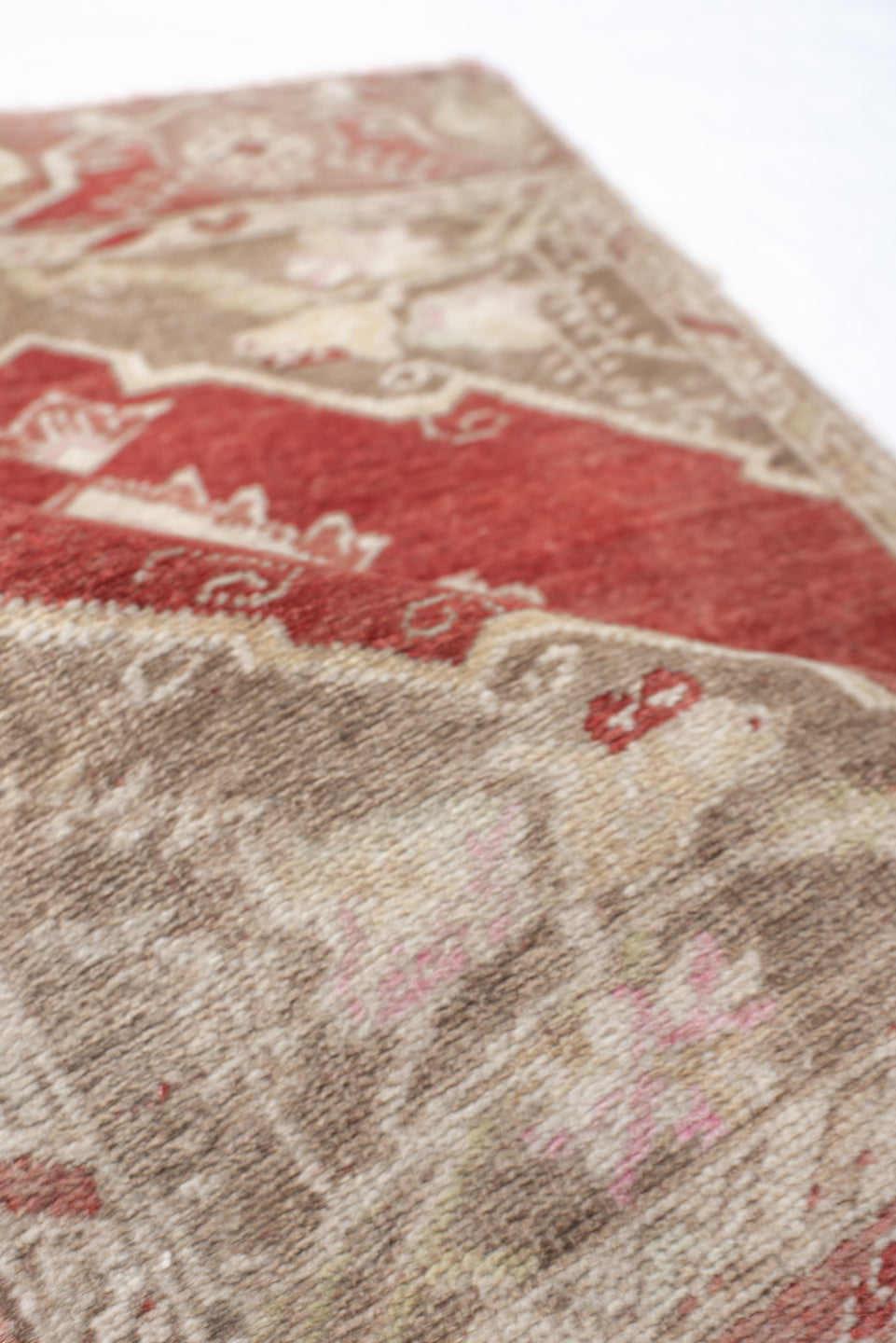 1' x 2' one-of-a-kind handmade vintage Anatolian small size rug. Color palette: terra cotta, taupe, ivory, blush, sage