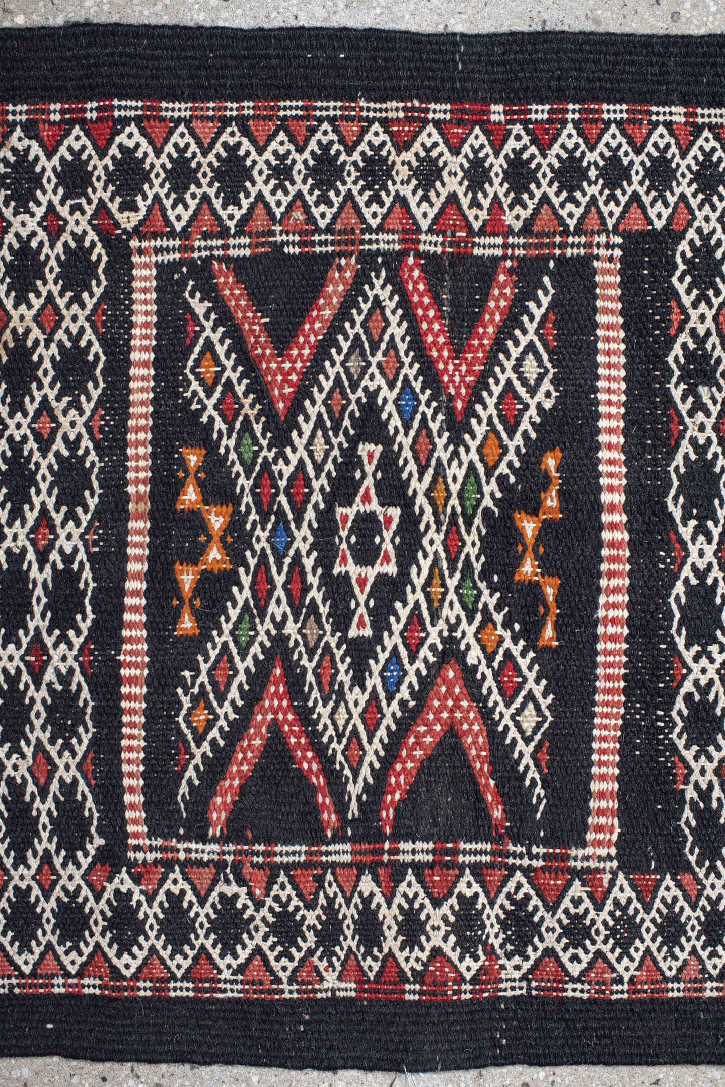 1' x 1' one-of-a-kind handmade vintage Jijim small size rug. Color palette: charcoal, ivory, rust, crimson, orange, blue