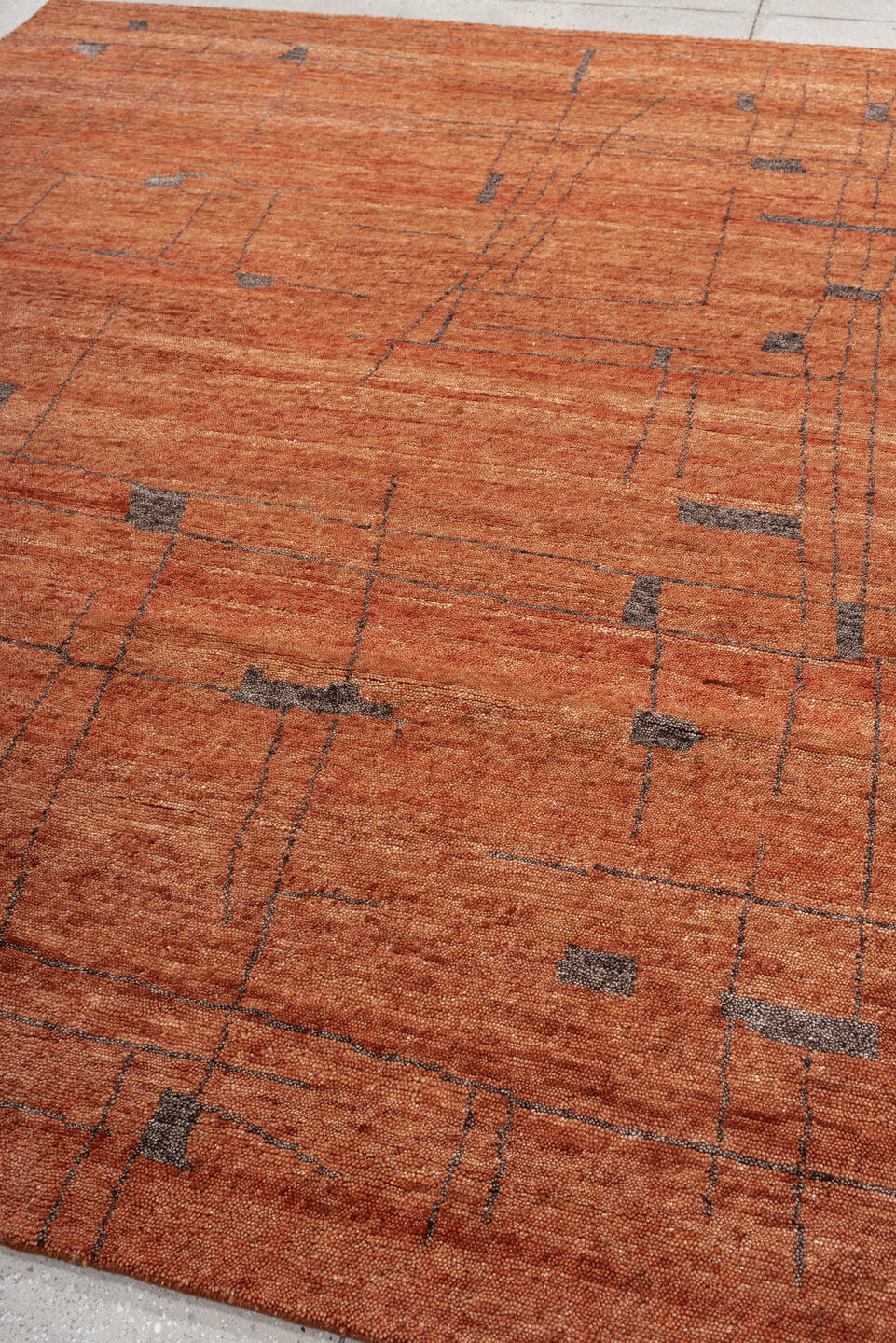 8' x 10' one-of-a-kind handmade vintage Tribeca large size rug. Color palette: terra cotta, rust, cinnamon, charcoal, copper