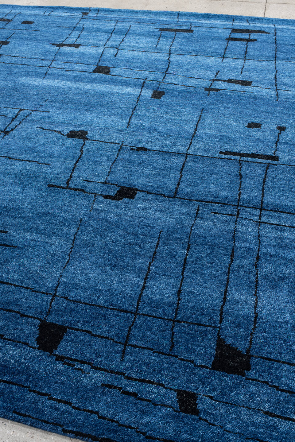 8' x 9' one-of-a-kind handmade vintage Tribeca rug. Color palette: blue, black, slate, gray