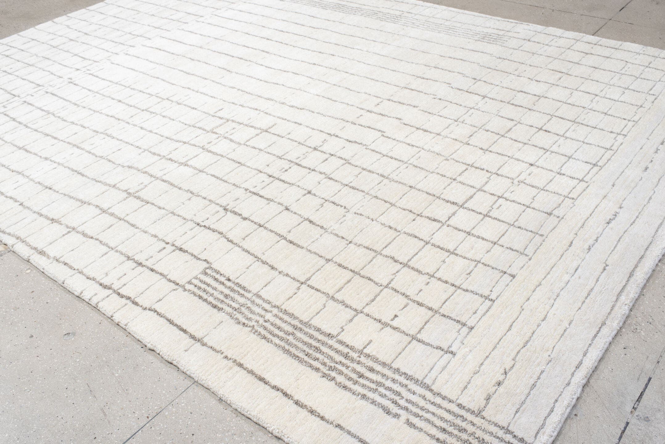 9' x 12' one-of-a-kind handmade vintage Tribeca large size rug. Color palette: ivory, taupe, cream, beige, light gray, gray