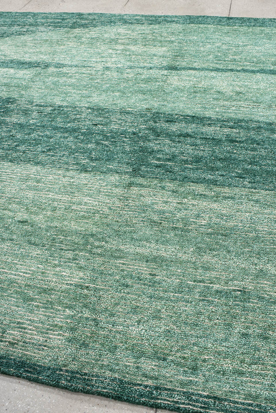 8' x 10' one-of-a-kind handmade vintage Tribeca large size rug. Color palette: seafoam, teal, sage, ivory, green