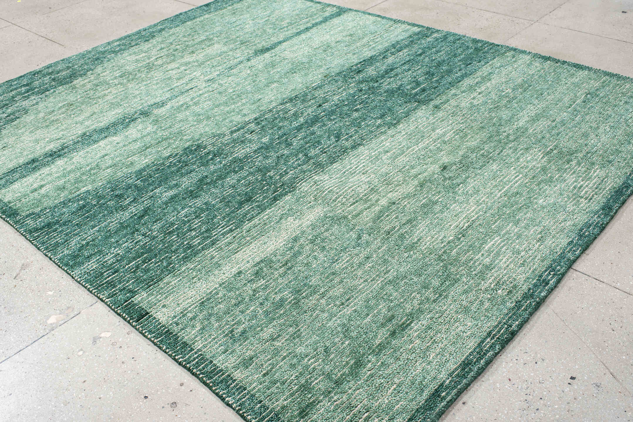 8' x 10' one-of-a-kind handmade vintage Tribeca large size rug. Color palette: seafoam, teal, sage, ivory, green