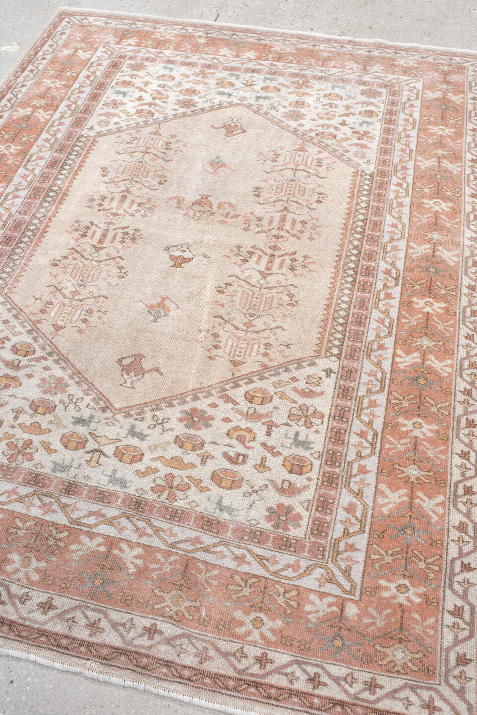 5' x 6' one-of-a-kind handmade vintage Melas rug. Color palette: ivory, blush, salmon, taupe, gray, camel, pink, beige