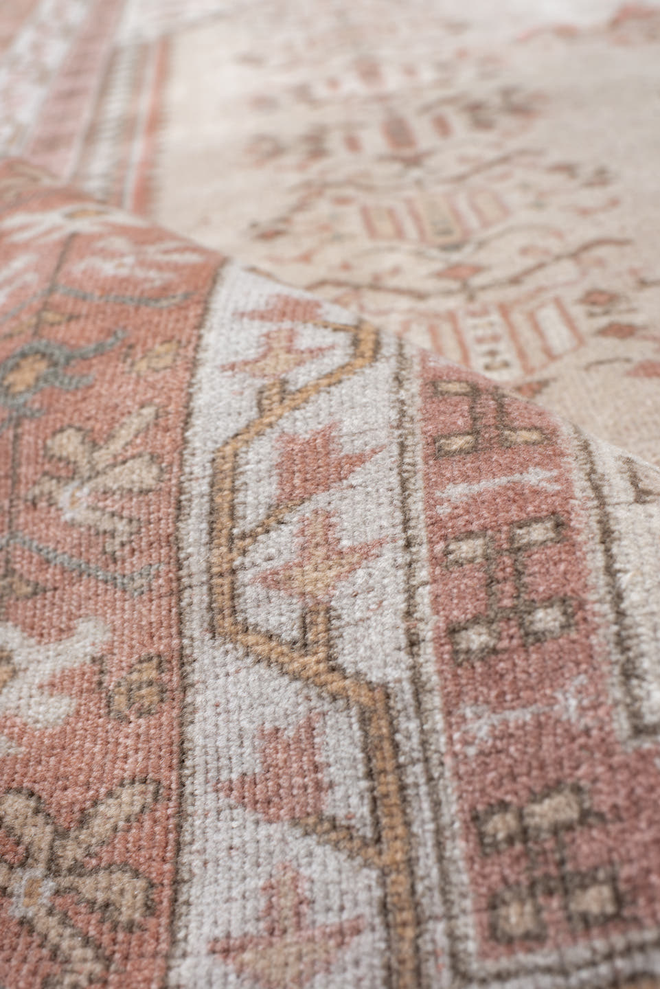 5' x 6' one-of-a-kind handmade vintage Melas rug. Color palette: ivory, blush, salmon, taupe, gray, camel, pink, beige