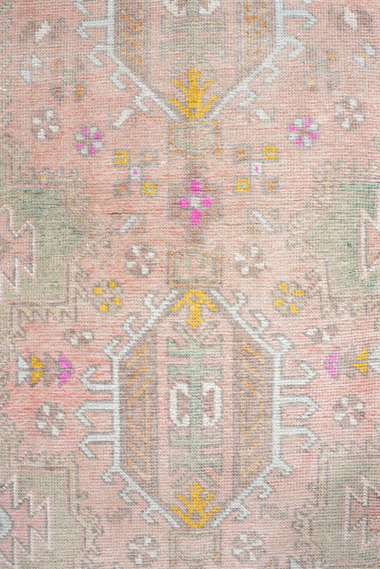3' x 12' one-of-a-kind handmade vintage Anatolian runner rug. Color palette: blush, taupe, ivory, sage, gold, rose, peach