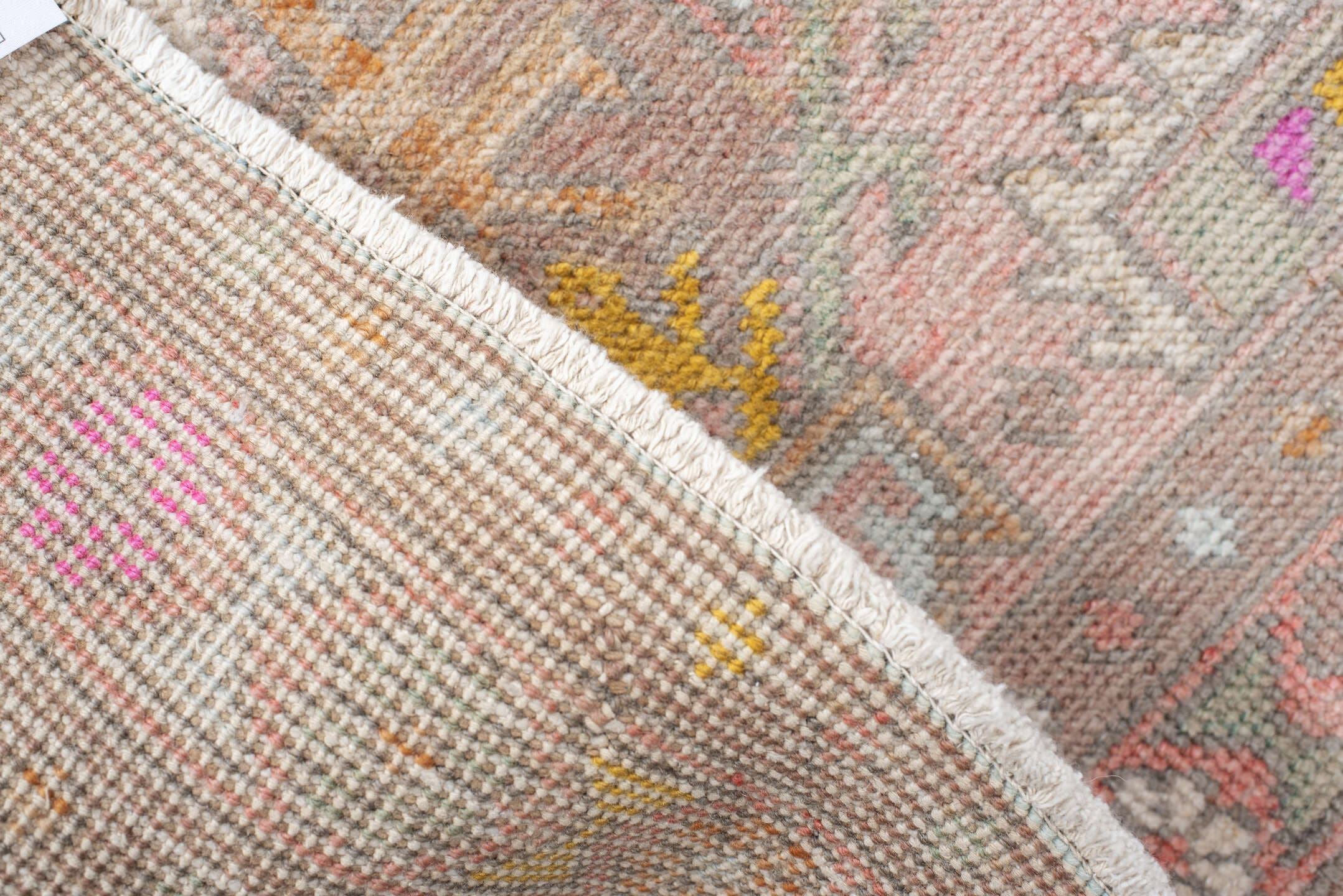 3' x 12' one-of-a-kind handmade vintage Anatolian runner rug. Color palette: blush, taupe, ivory, sage, gold, rose, peach