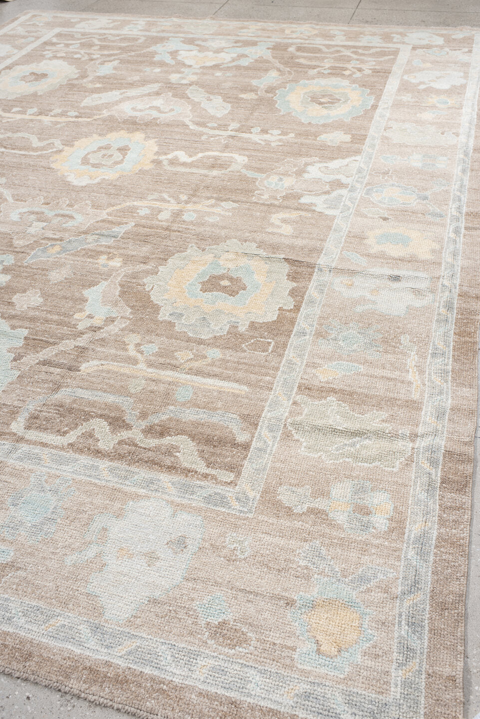 10' x 14' one-of-a-kind handmade vintage large size rug. Color palette: taupe, ivory, pale aqua, cream, soft gold, beige