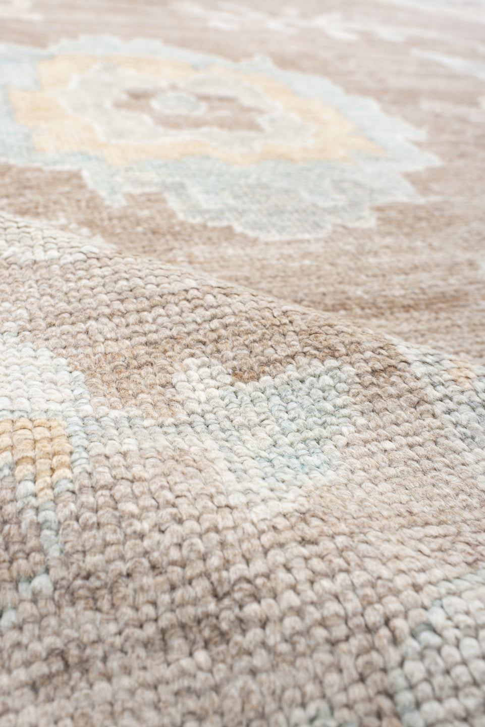 10' x 14' one-of-a-kind handmade vintage large size rug. Color palette: taupe, ivory, pale aqua, cream, soft gold, beige