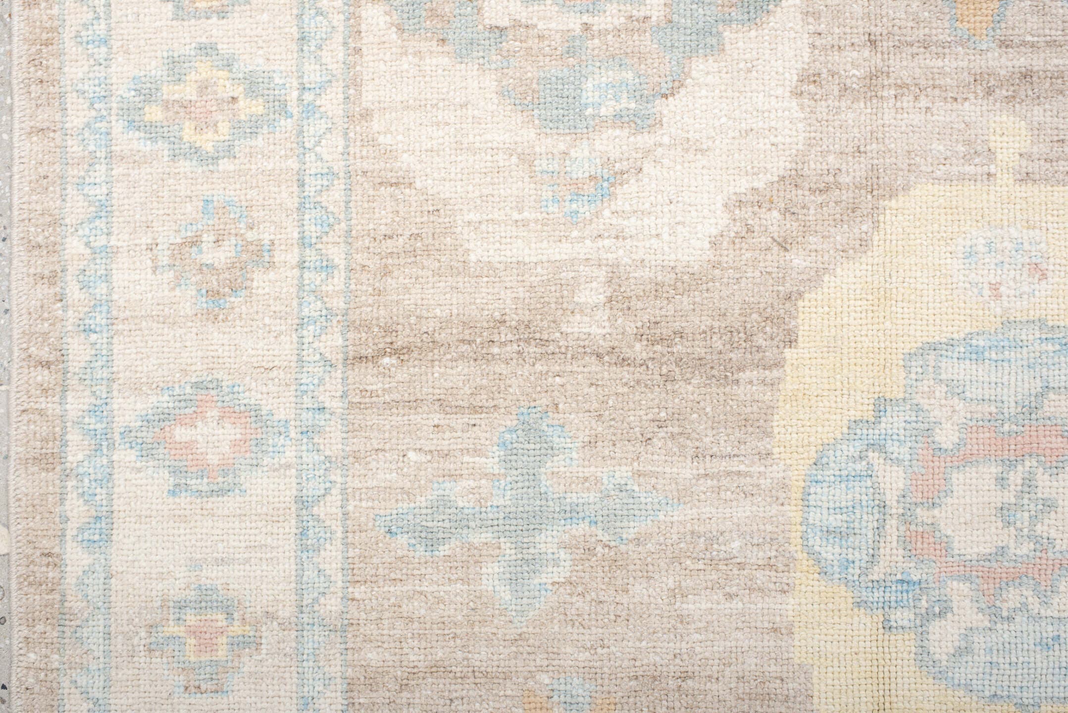 9' x 12' one-of-a-kind handmade vintage Oushak large size rug. Color palette: taupe, ivory, pale blue, peach, soft gold
