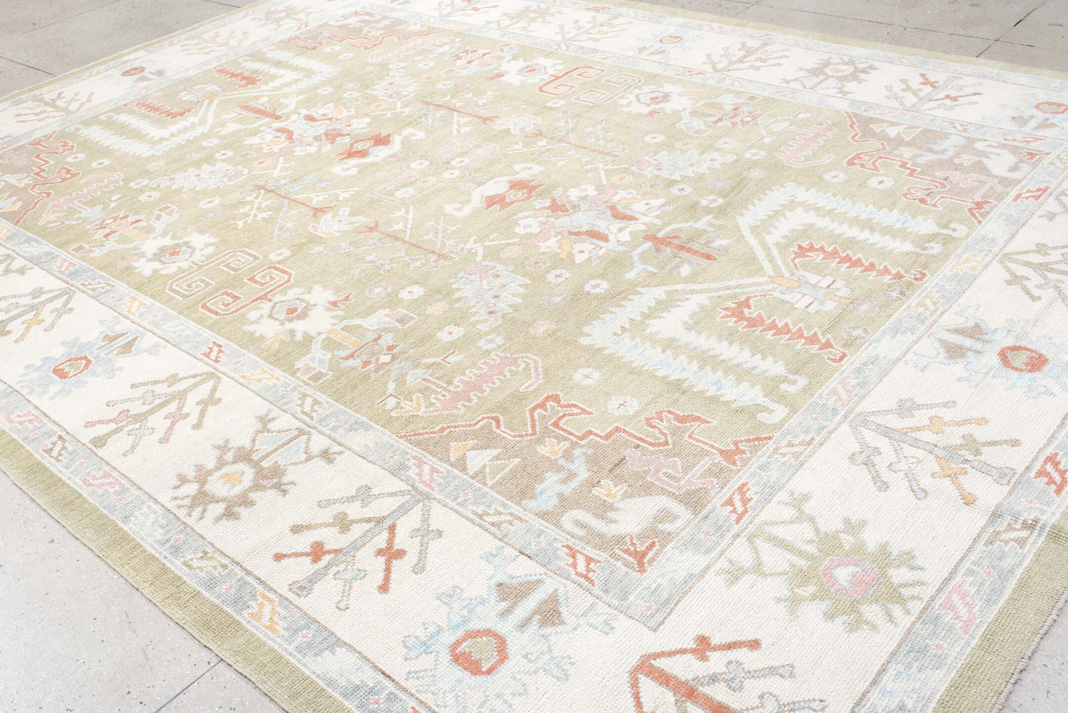 10' x 13' one-of-a-kind handmade vintage Oushak large size rug. Color palette: sage, ivory, pale blue, taupe, coral, cream