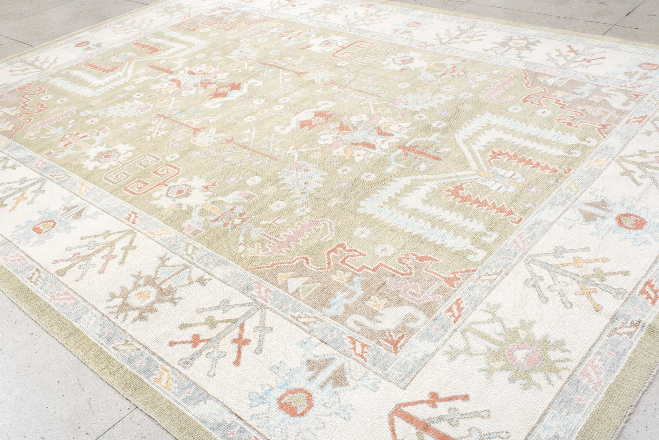 10' x 13' one-of-a-kind handmade vintage Oushak large size rug. Color palette: sage, ivory, pale blue, taupe, coral, cream