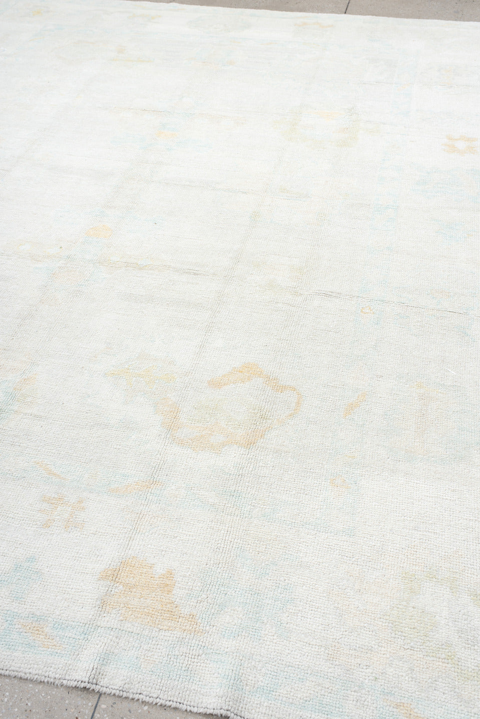 8' x 11' one-of-a-kind handmade vintage Oushak large size rug. Color palette: ivory, pale aqua, cream, soft gold, beige