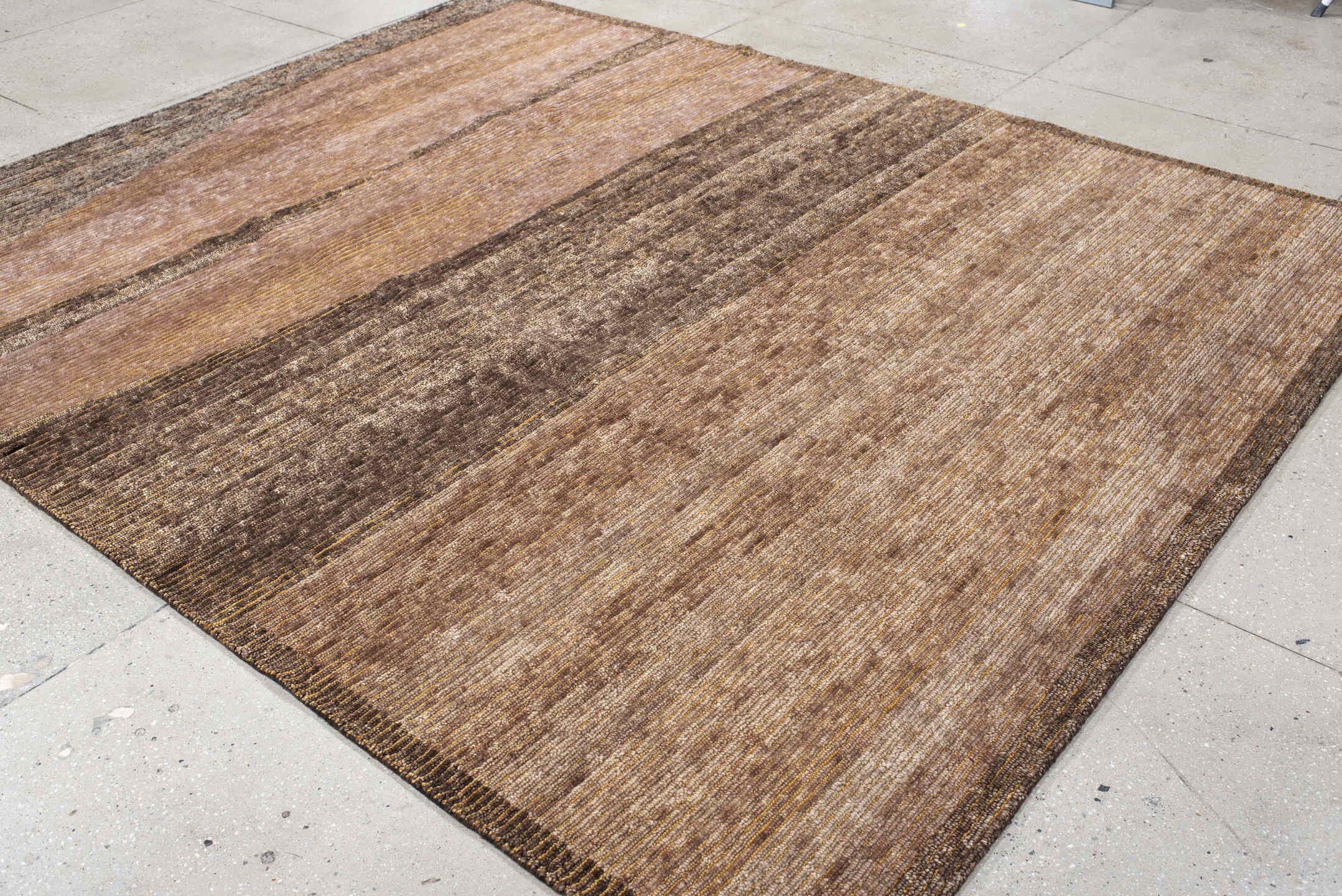 8' x 10' one-of-a-kind handmade vintage Tribeca large size rug. Color palette: taupe, brown, mocha, camel, beige, gray