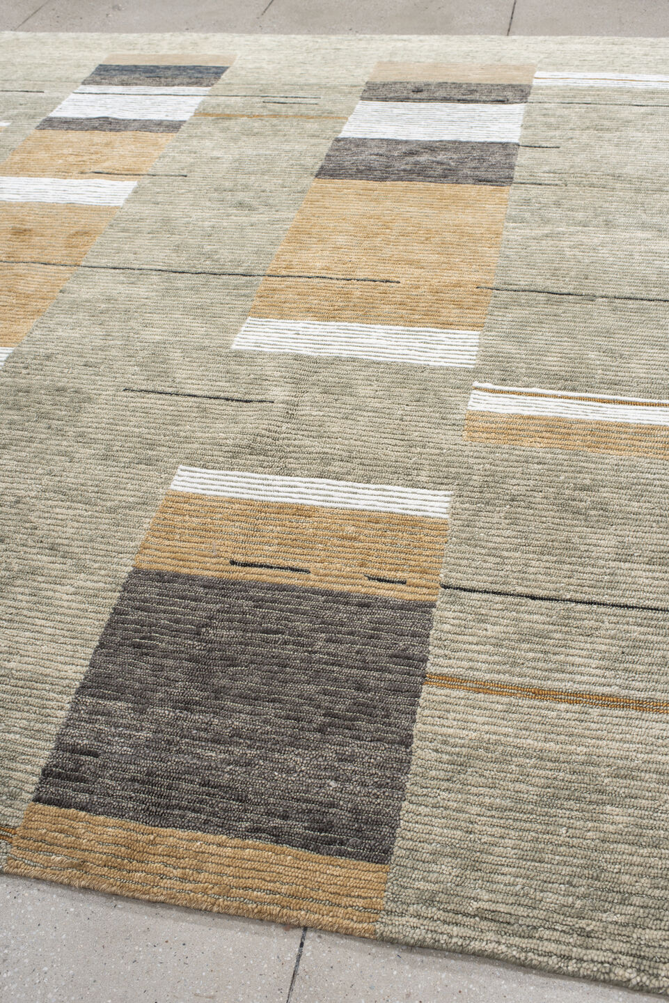 8' x 9' one-of-a-kind handmade vintage Tribeca rug. Color palette: taupe, ivory, camel, charcoal, gray, ochre, beige, black