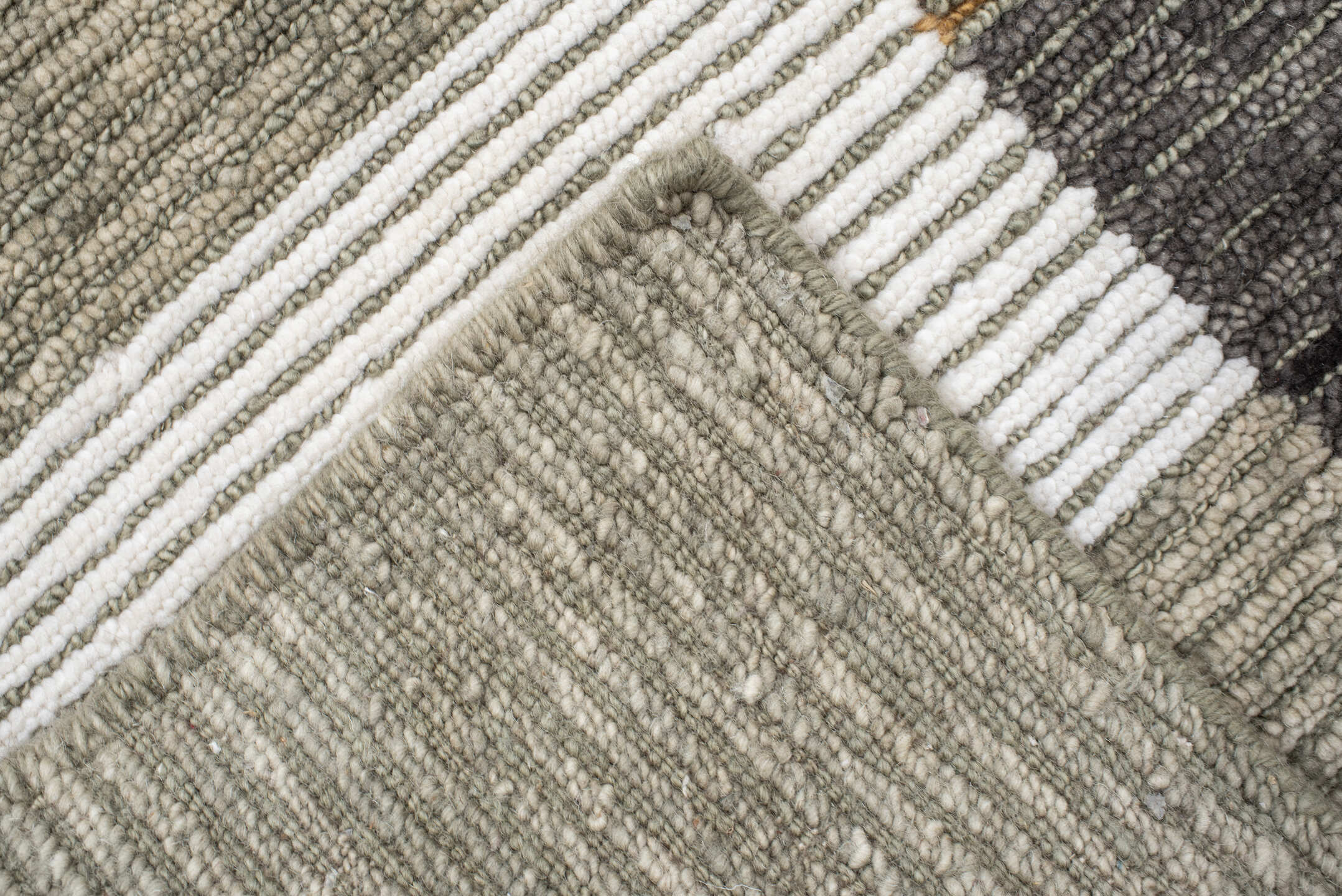 8' x 9' one-of-a-kind handmade vintage Tribeca rug. Color palette: taupe, ivory, camel, charcoal, gray, ochre, beige, black