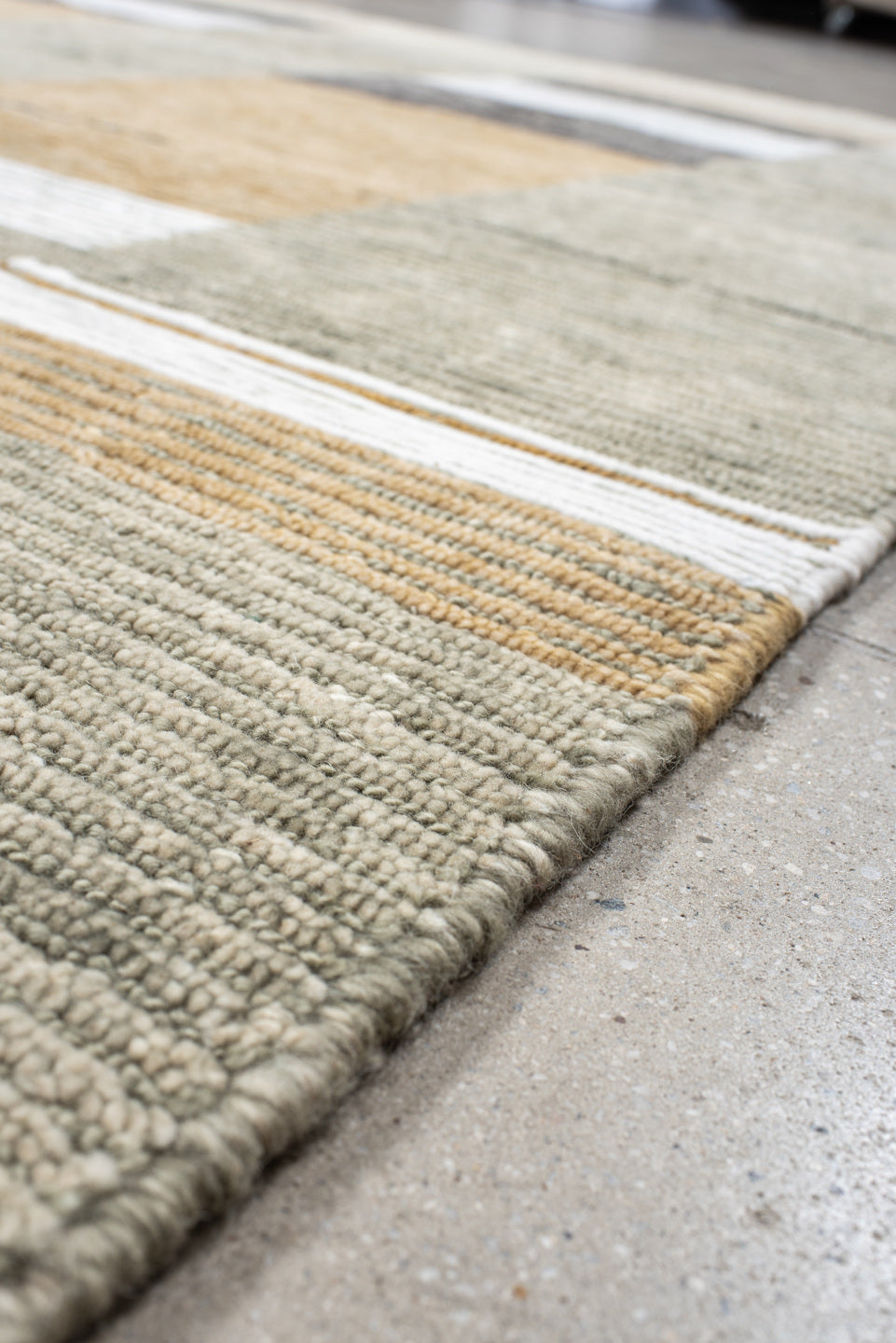 8' x 9' one-of-a-kind handmade vintage Tribeca rug. Color palette: taupe, ivory, camel, charcoal, gray, ochre, beige, black