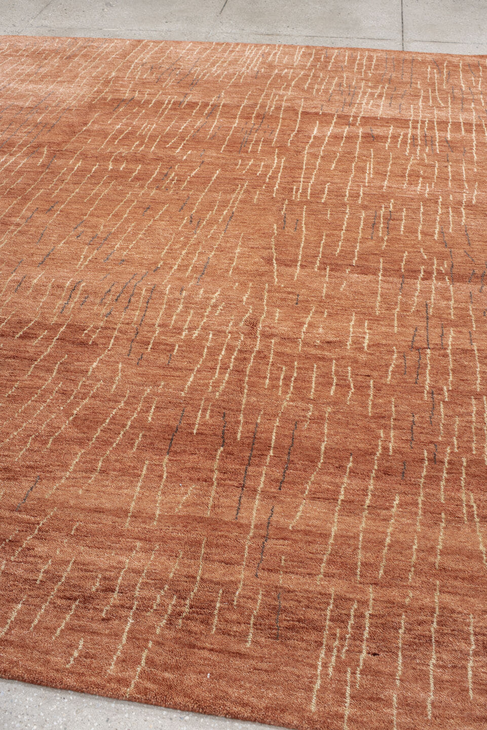 8' x 9' one-of-a-kind handmade vintage Tribeca rug. Color palette: terra cotta, rose, ivory, charcoal, terracotta, brown