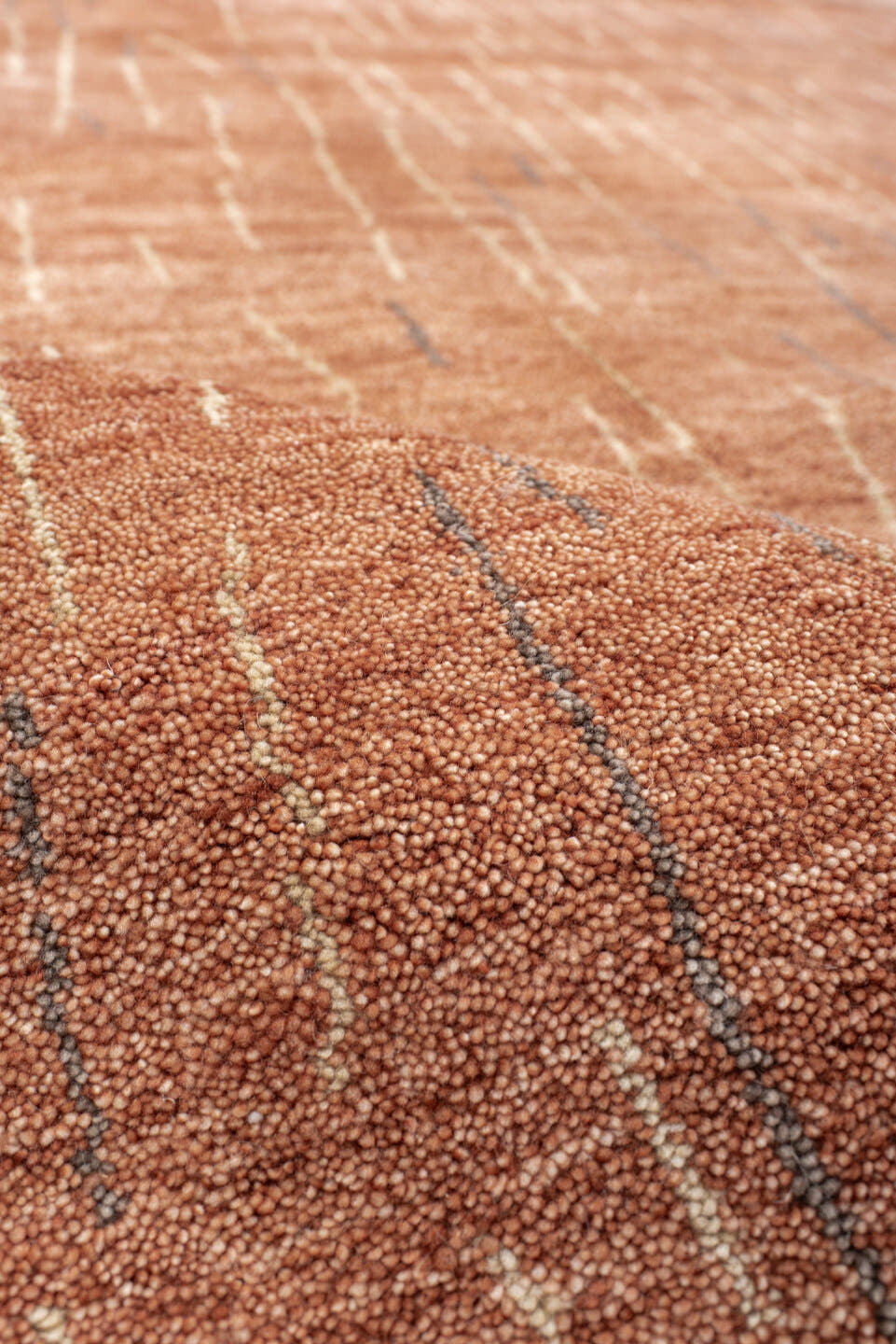 8' x 9' one-of-a-kind handmade vintage Tribeca rug. Color palette: terra cotta, rose, ivory, charcoal, terracotta, brown