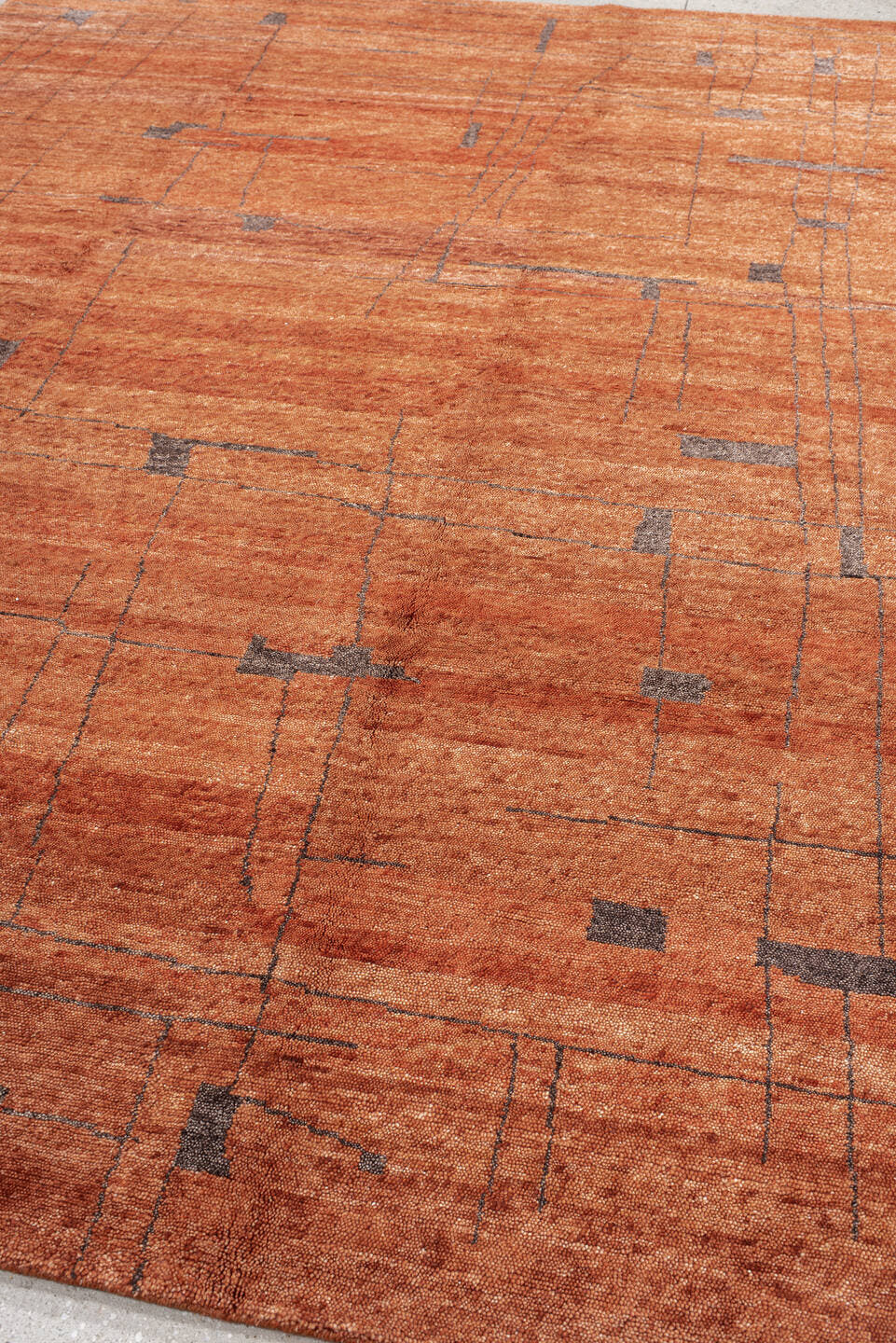 9' x 12' one-of-a-kind handmade vintage Tribeca large size rug. Color palette: terra cotta, rust, charcoal, copper