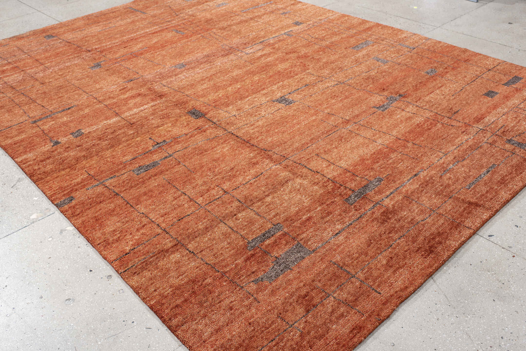 9' x 12' one-of-a-kind handmade vintage Tribeca large size rug. Color palette: terra cotta, rust, charcoal, copper