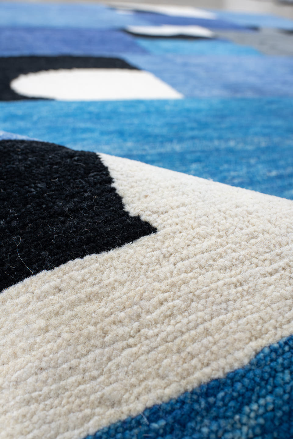 8' x 10' one-of-a-kind handmade vintage Tribeca large size rug. Color palette: blue, gray, ivory, navy, black, sky_blue