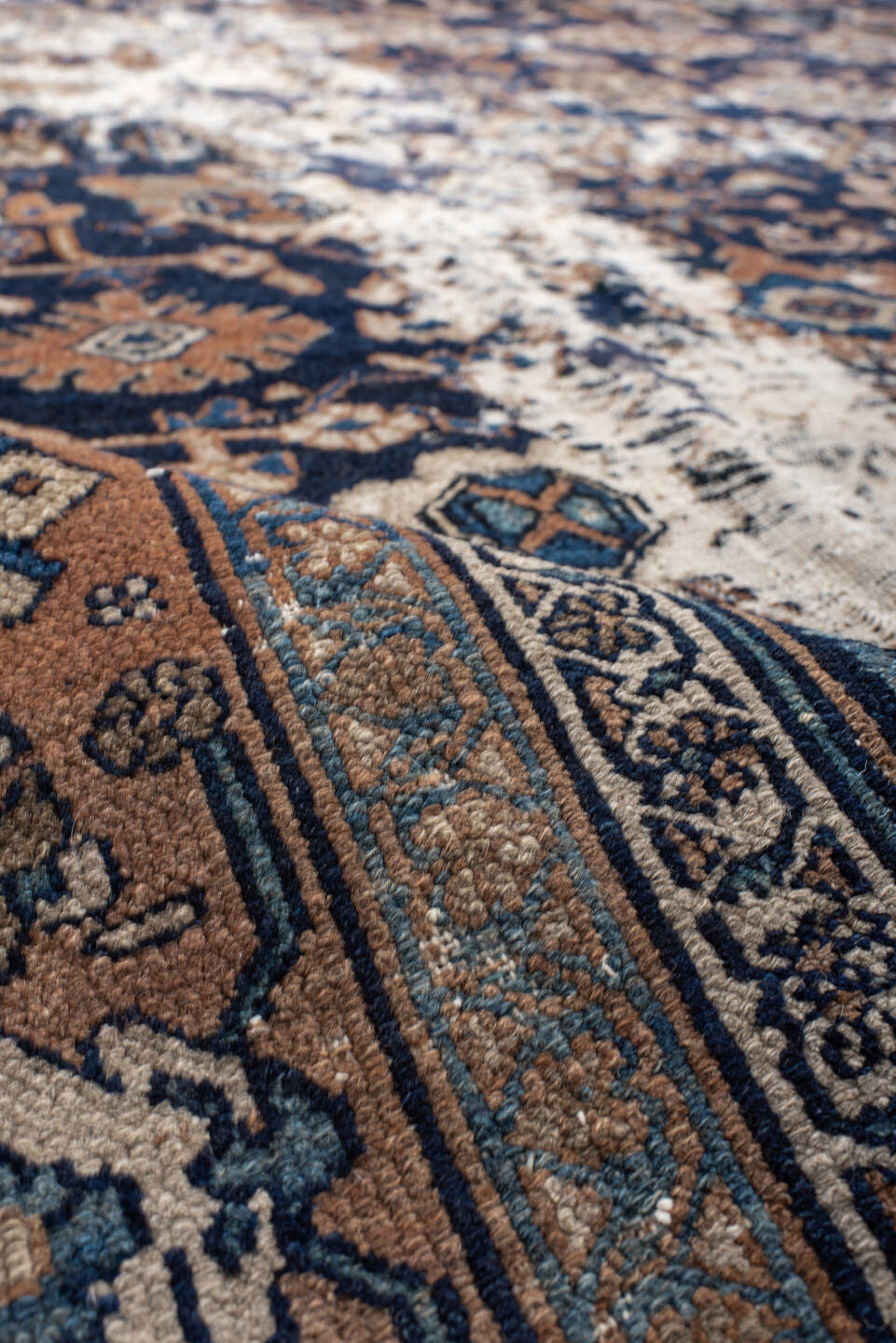 10' x 13' one-of-a-kind handmade vintage Malayer large size rug. Color palette: navy, terracotta, ivory, camel, sky blue